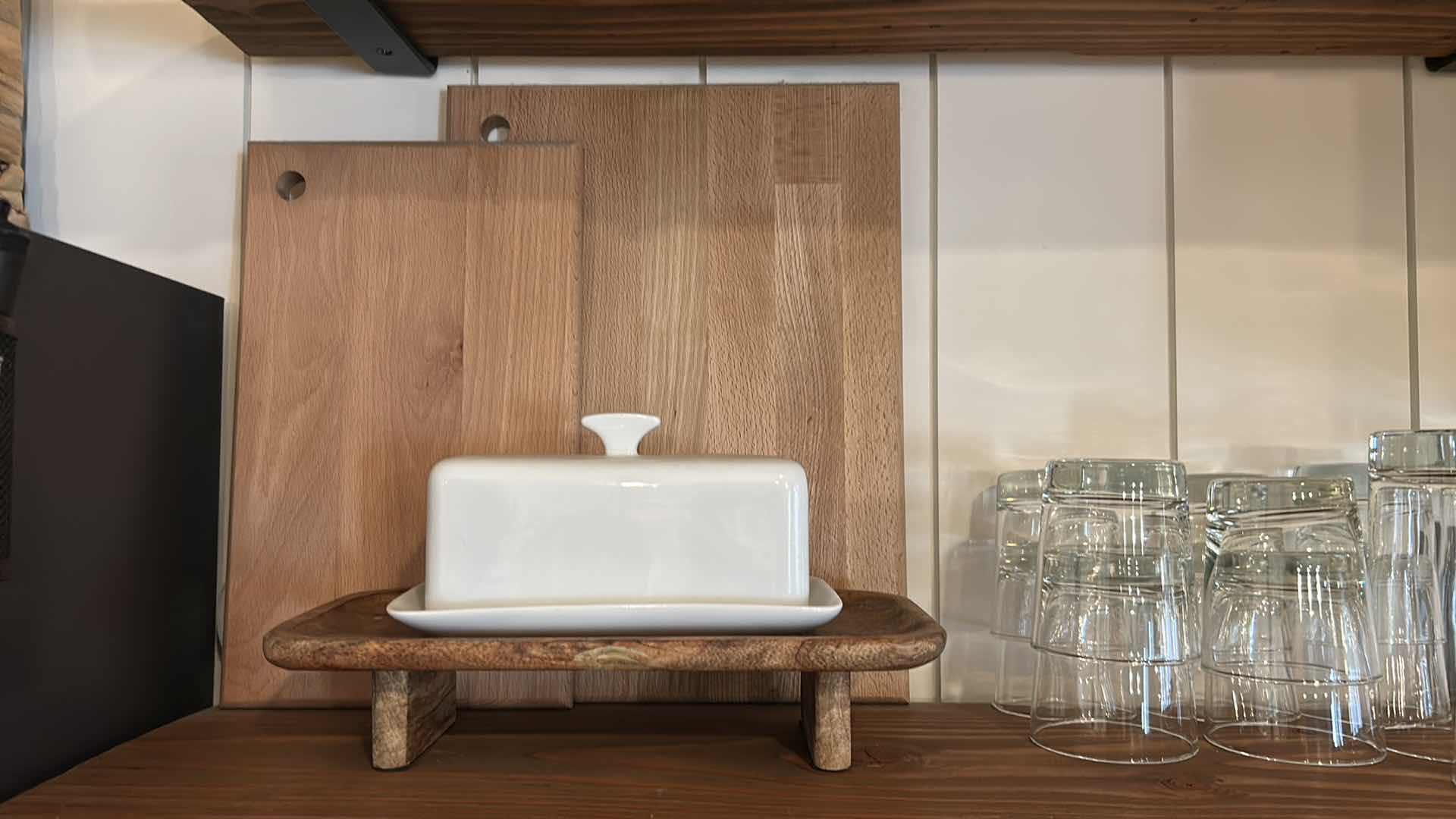 Photo 1 of CONTENTS OF SHELF CUTTING BOARDS 15 GLASSWARE BUTTER DISH