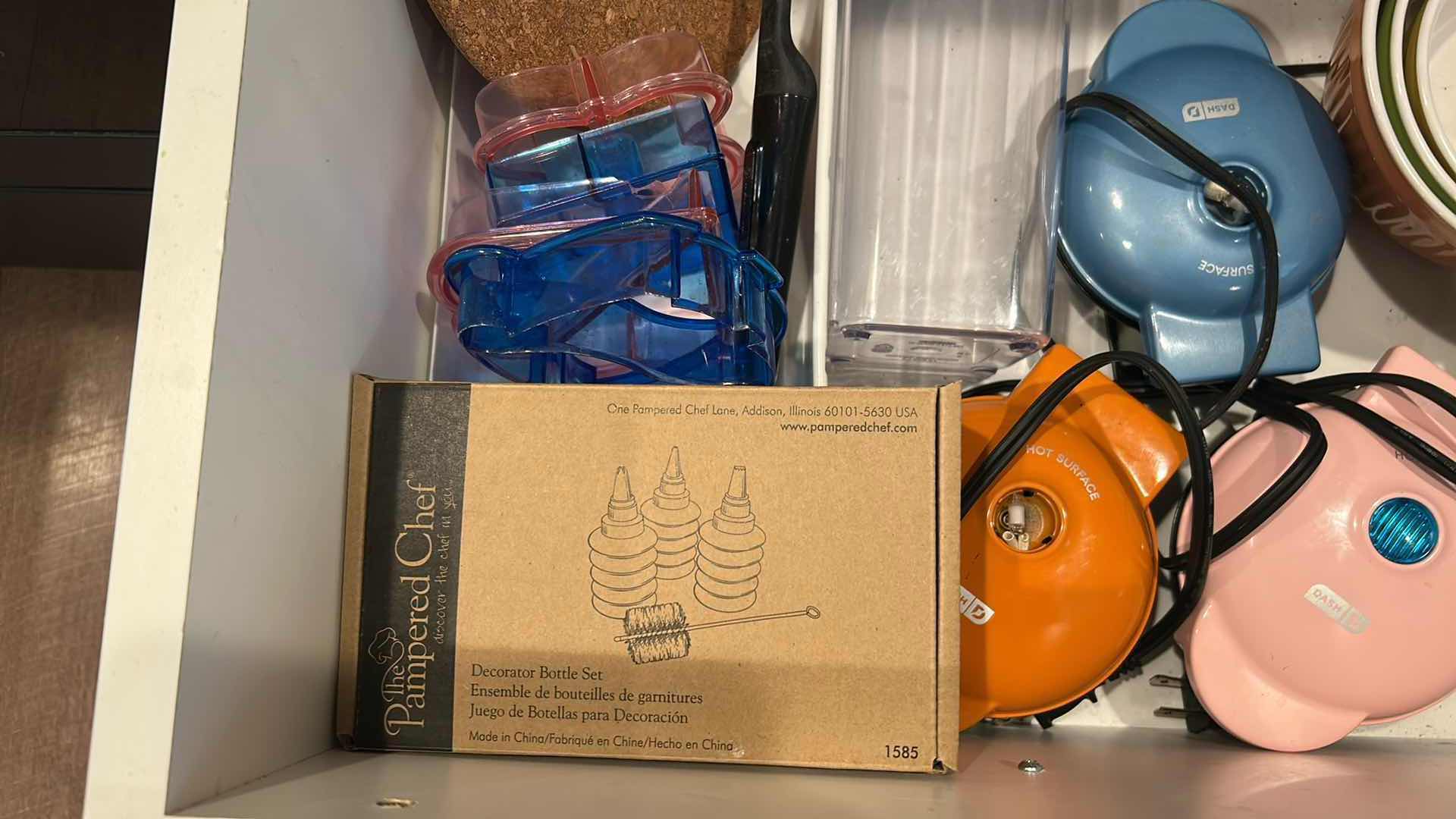 Photo 1 of CONTENTS OF DRAWER ASSORTED MINI CAKE MAKER PLASTICS
