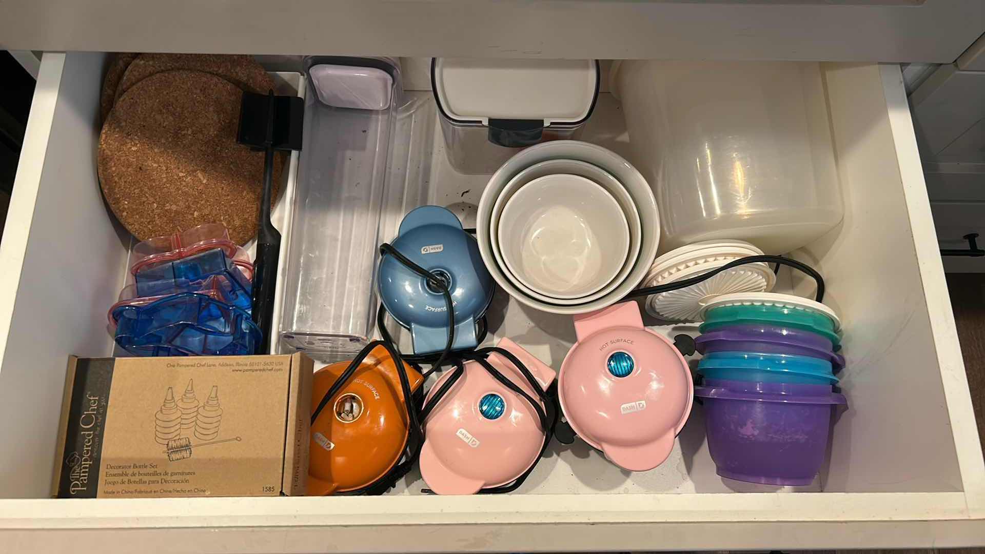 Photo 1 of CONTENTS OF DRAWER ASSORTED MINI CAKE MAKER PLASTICS