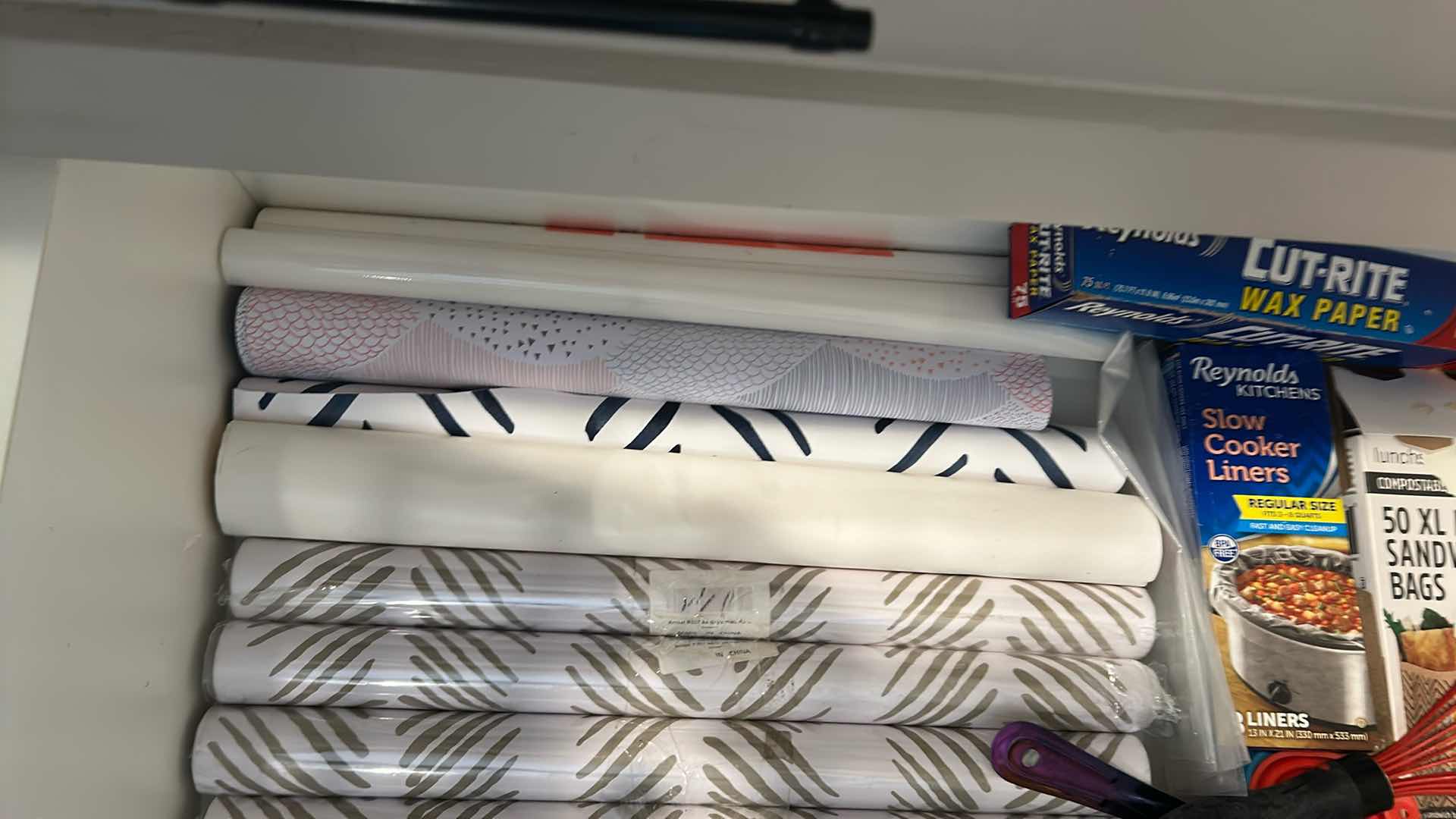 Photo 1 of CONTENTS OF DRAWER ASSORTED SHELF PAPER COOKING UTENSILS