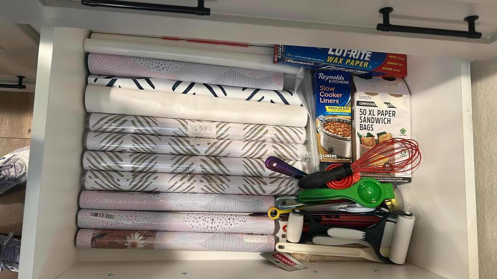 Photo 1 of CONTENTS OF DRAWER ASSORTED SHELF PAPER COOKING UTENSILS