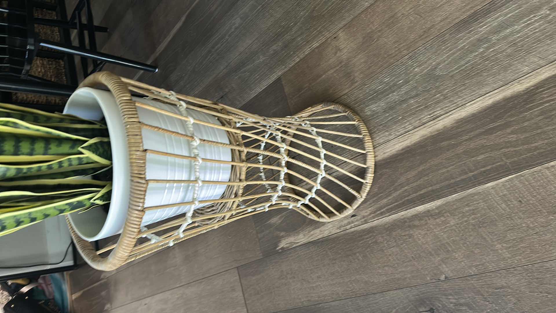 Photo 1 of 2- FAUX PLANTS IN A RATAN STAND H 24”