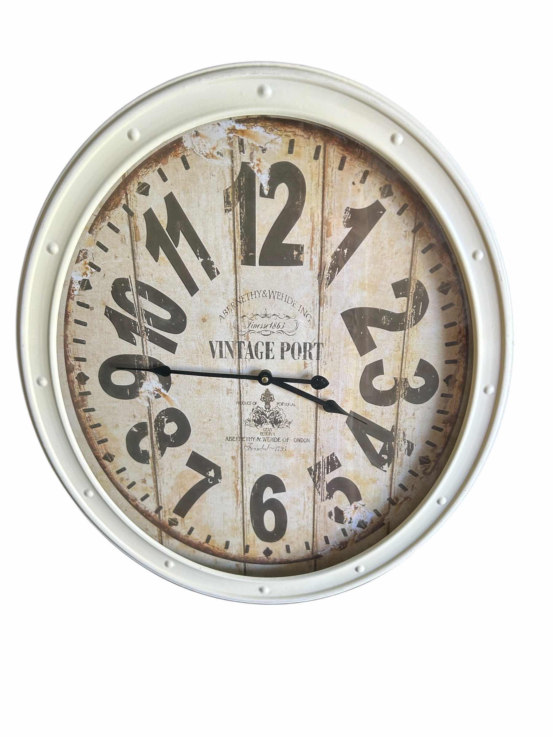 Photo 1 of CREAM COLOR METAL WALL CLOCK 20” X 24”