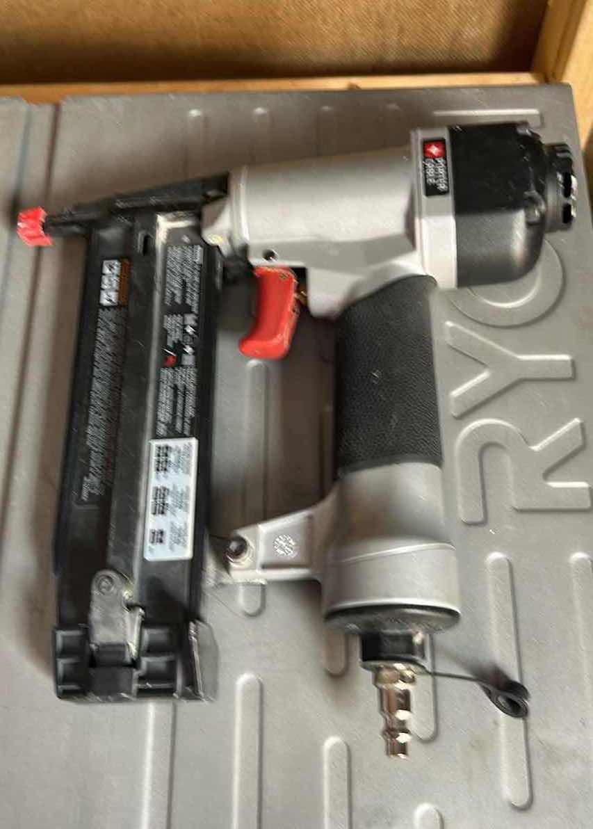 Photo 1 of CONTENTS OF DRAWER 3- PORTER CABLE GUAGE BRAD NAILER