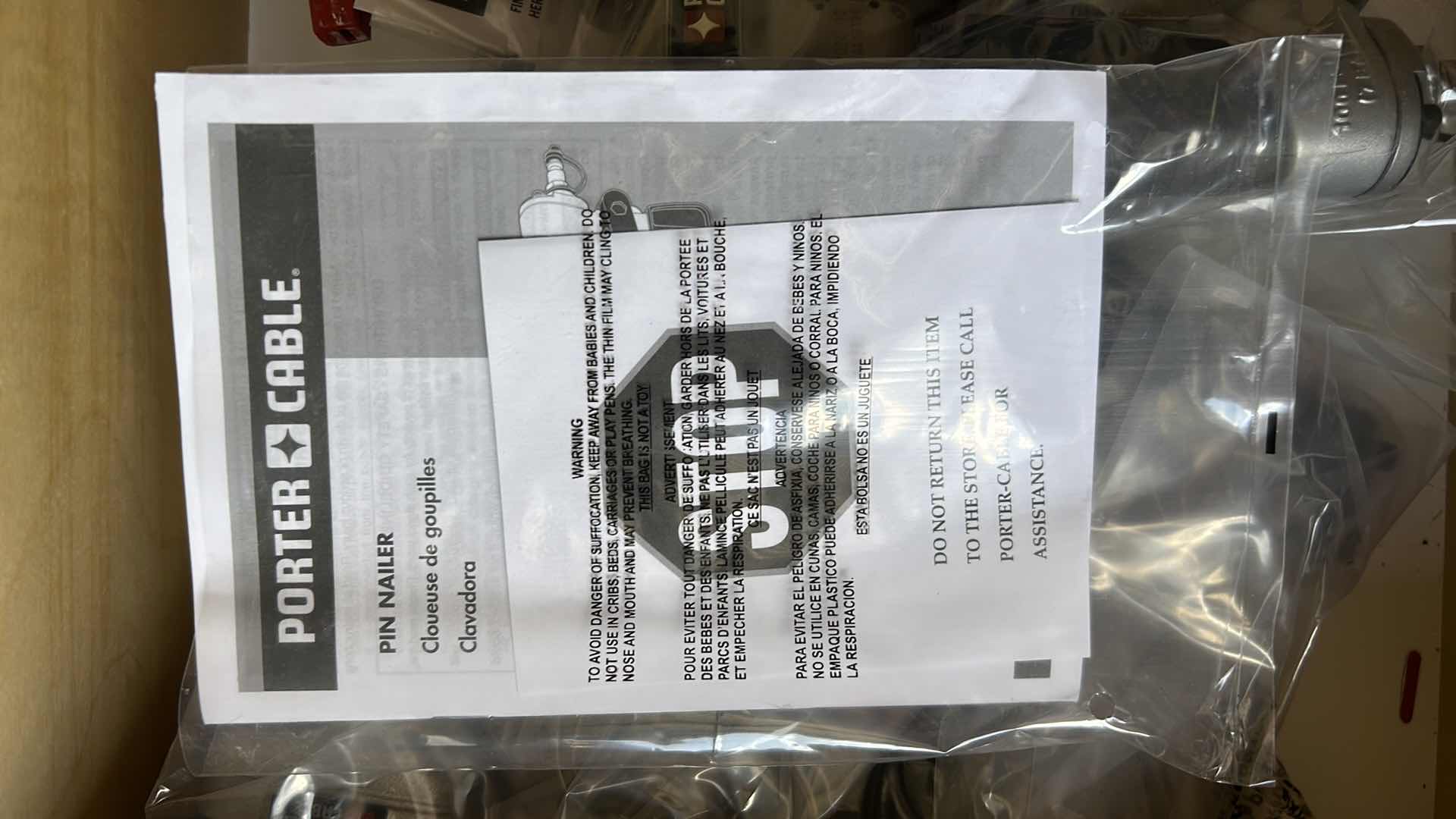Photo 1 of CONTENTS OF DRAWER 3- PORTER CABLE GUAGE BRAD NAILER