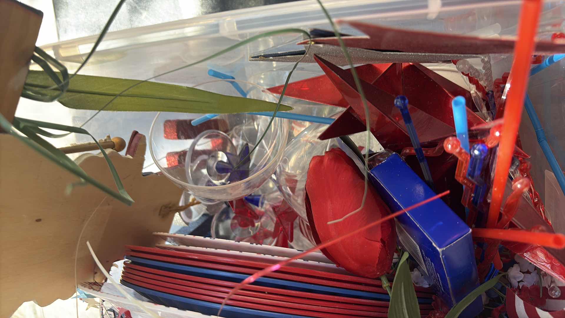 Photo 1 of CONTENTS OF TOTE FOURTH OF JULY  DECORATIONS