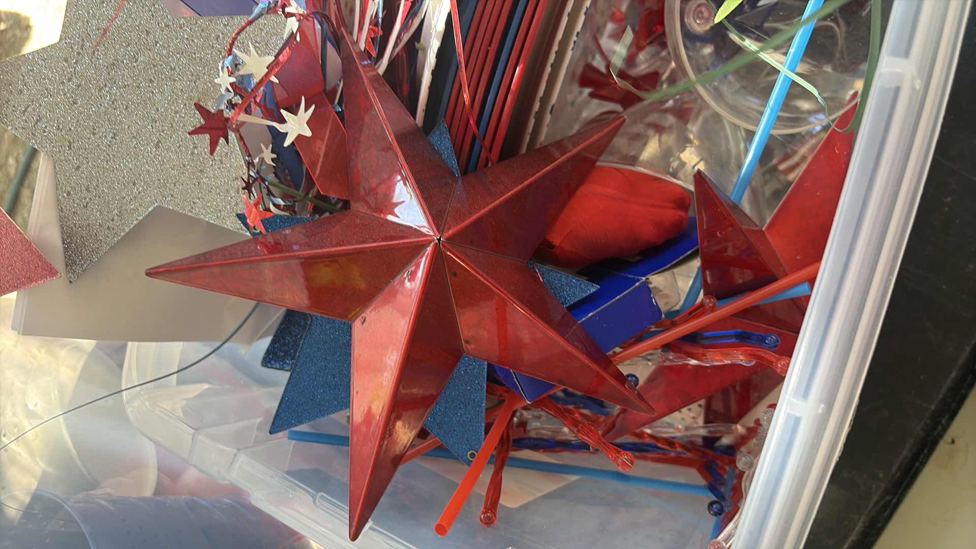 Photo 1 of CONTENTS OF TOTE FOURTH OF JULY  DECORATIONS
