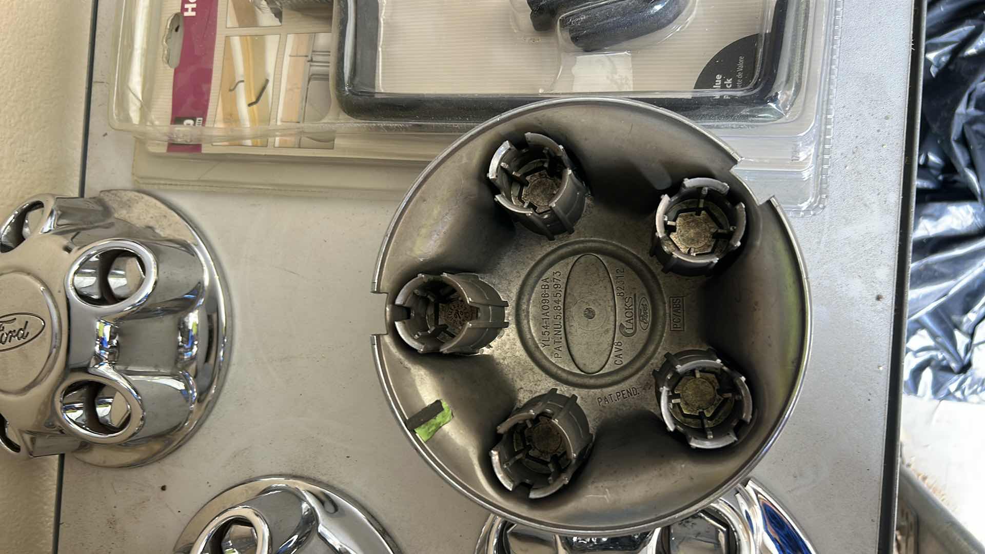 Photo 1 of 4 FORD HUBCAPS & NEW  HEAVY  DUTY GARAGE HOOKS