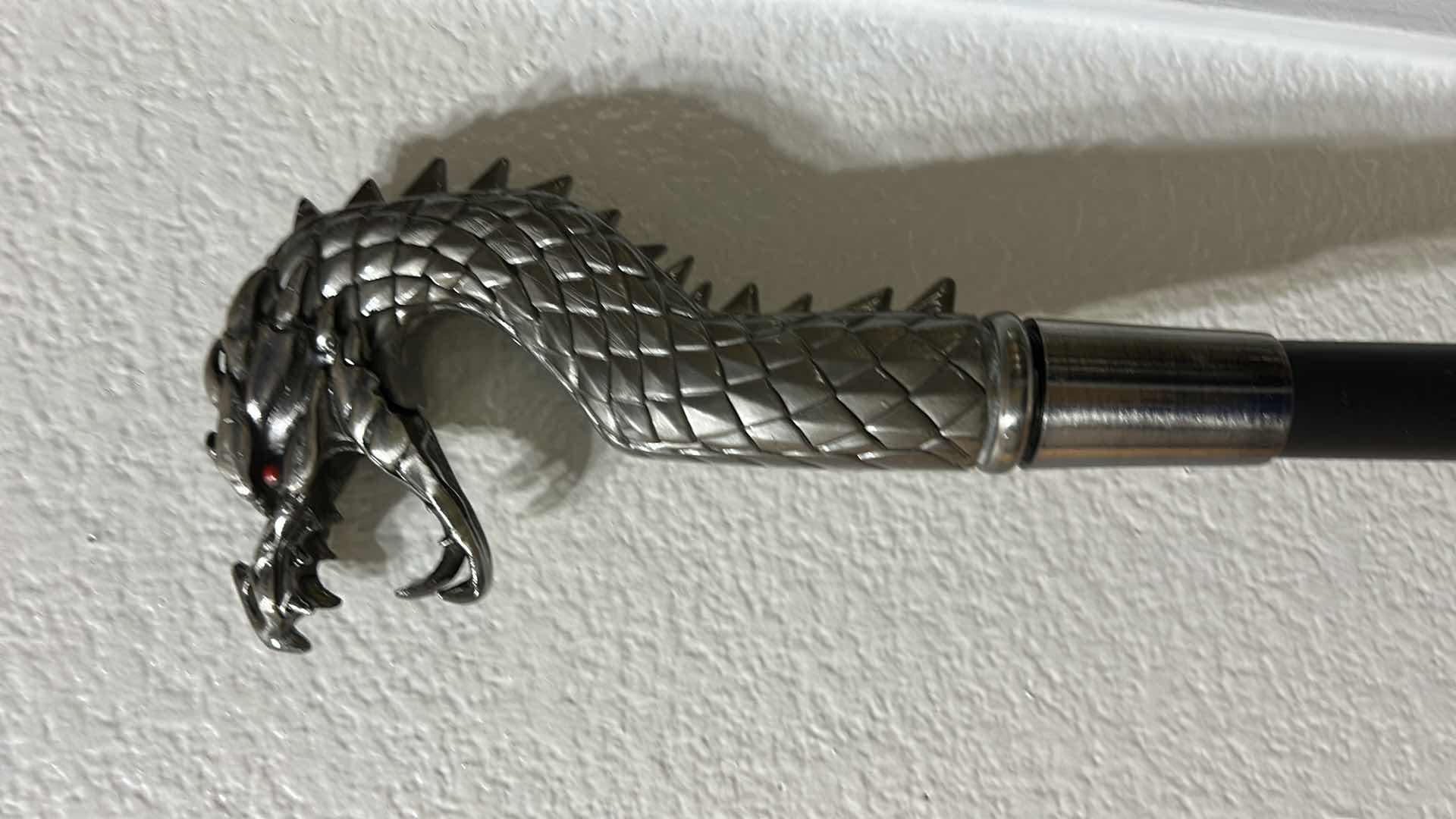 Photo 1 of REPLICA OF LUCIUS MALFOY’S WALKING STICK FROM THE HARRY POTTER SERIES, MADE OF METAL & WOOD  H35”