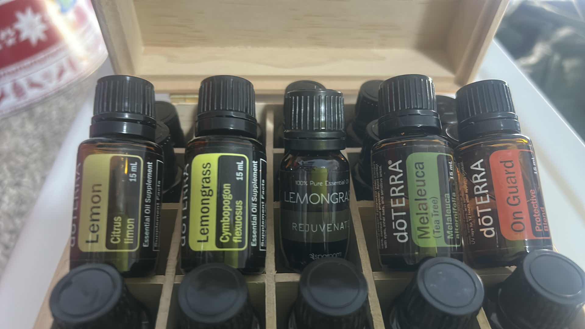 Photo 1 of doTERRA ESSENTIAL OILS IN BOX