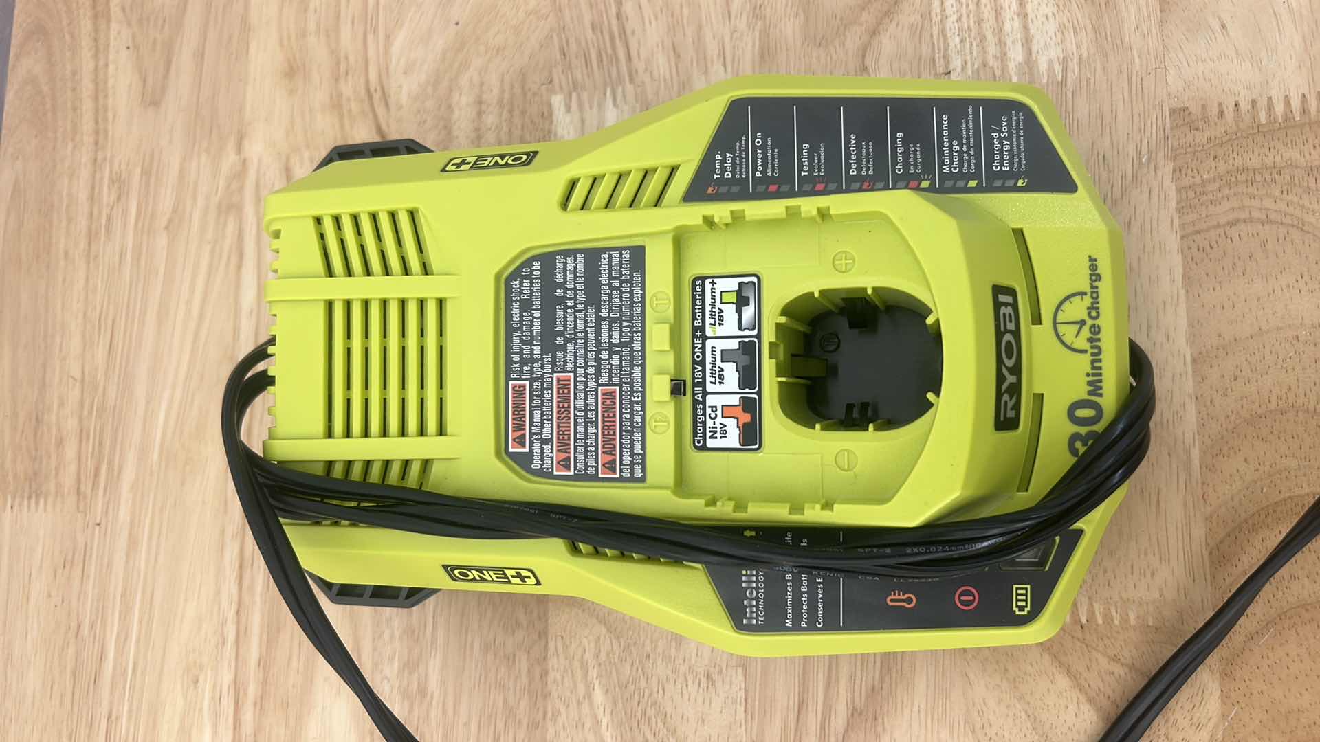 Photo 1 of RYOBI BATTERY OPERATED BLOWER WITH CHARGER