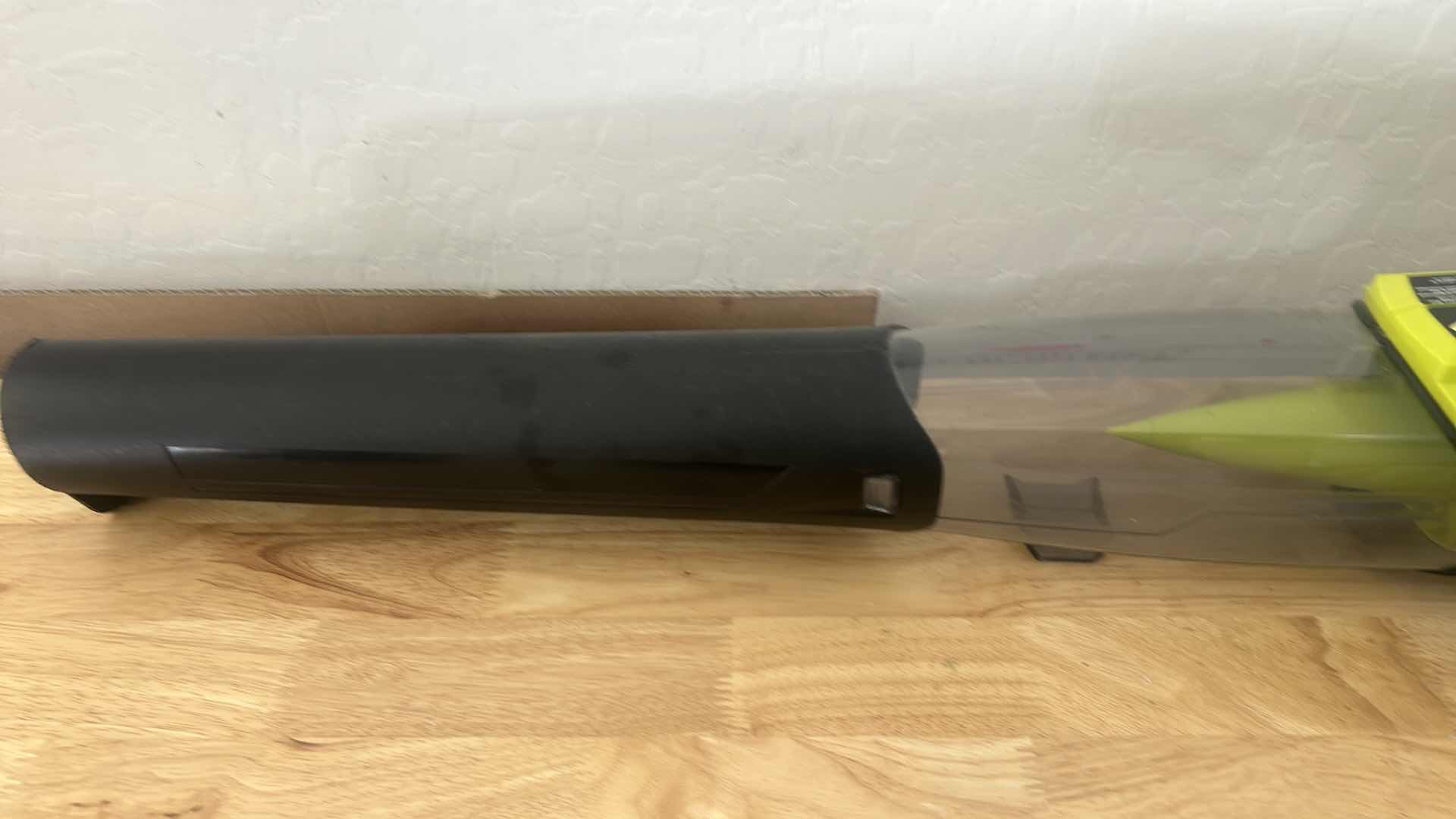 Photo 1 of RYOBI BATTERY OPERATED BLOWER WITH CHARGER