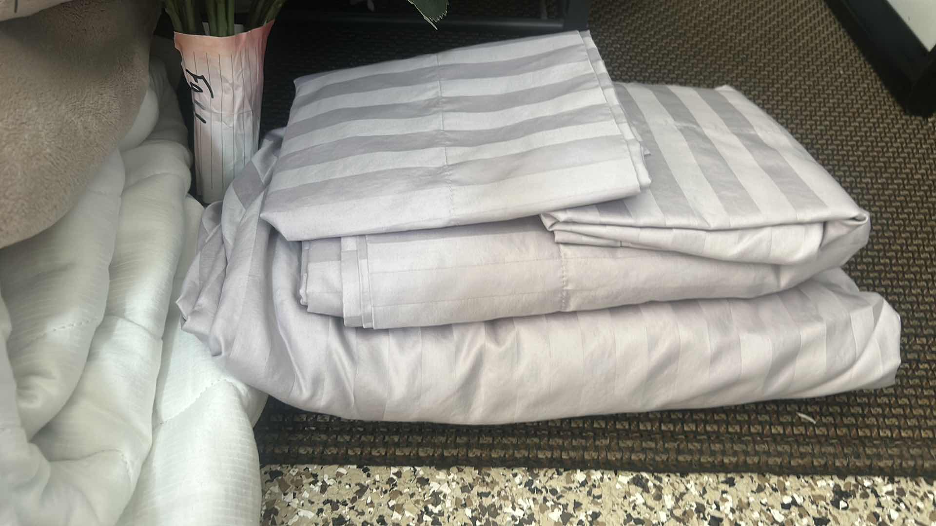 Photo 1 of FRESHLY LAUNDERED QUEEN COMFORTER, PILLOW CASES, SHEETS, BLANKET, MATTRESS COVER AND FLOWERS