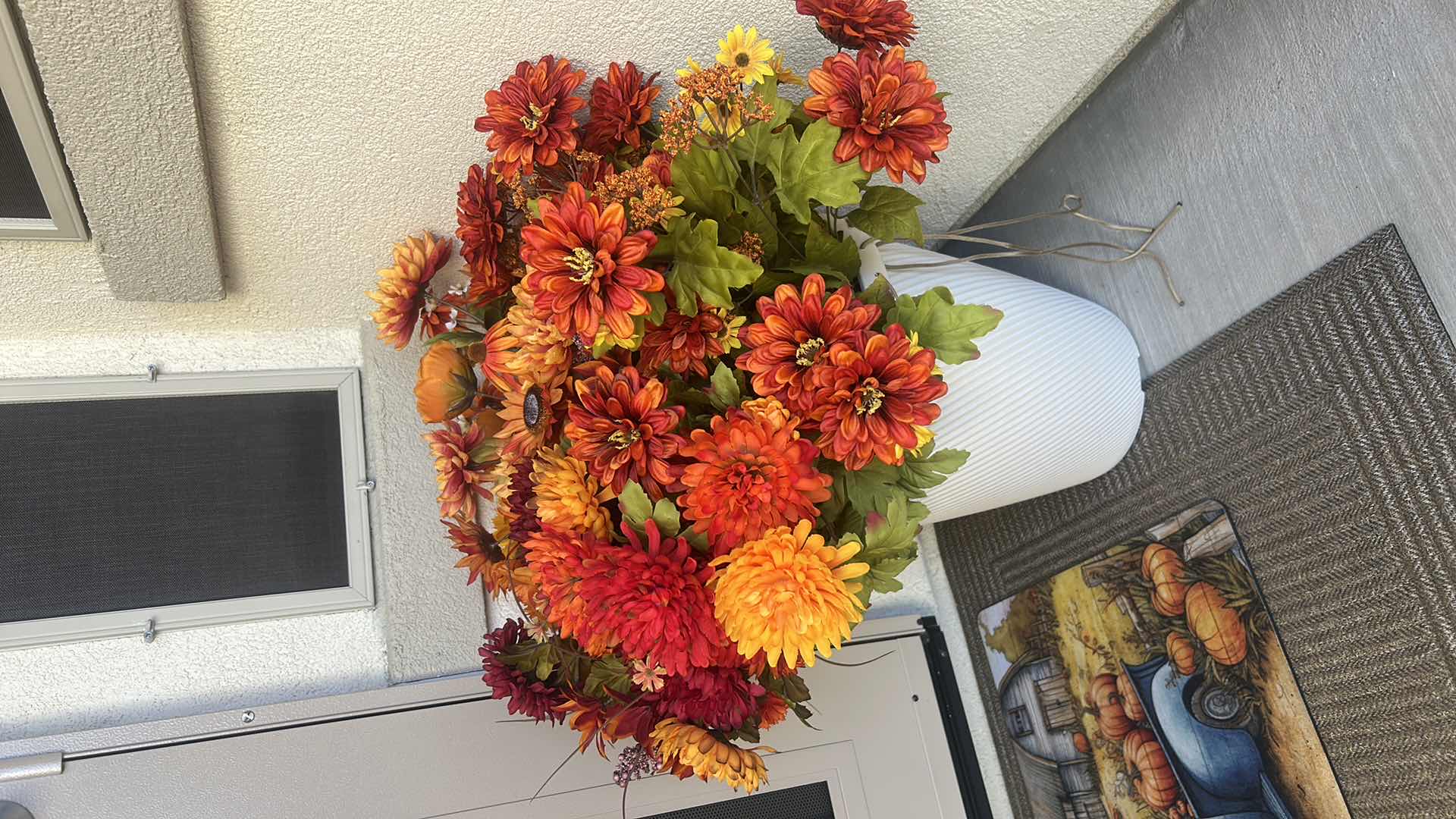 Photo 1 of 2 OUTDOOR FAUX FALL FLORAL ARRANGEMENTS H27” (POTS ARE HARD PLASTIC) AND  2 SCARECROWS H17”