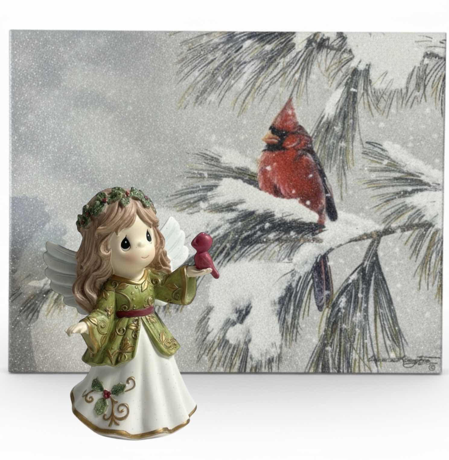 Photo 1 of STRETCHED CANVAS, WINTER CARDINAL GLITTERY ARTWORK 14” x H11 1/2” AND PRECIOUS MOMENTS ANGEL WITH BIRD