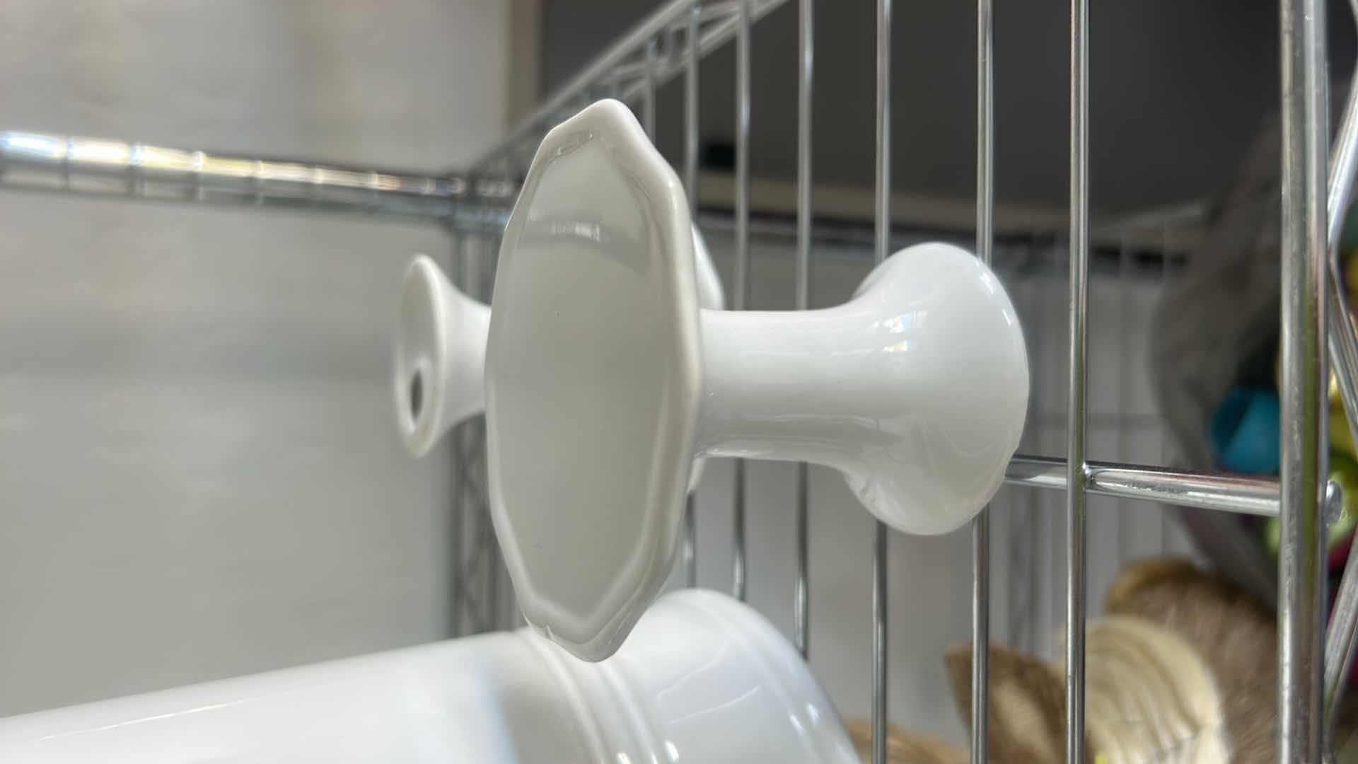 Photo 1 of WHITE PORCELAIN LIDDED COW CANISTER H12” & 2 CANDLE HOLDERS