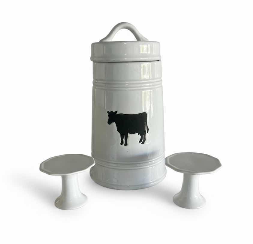 Photo 1 of WHITE PORCELAIN LIDDED COW CANISTER H12” & 2 CANDLE HOLDERS