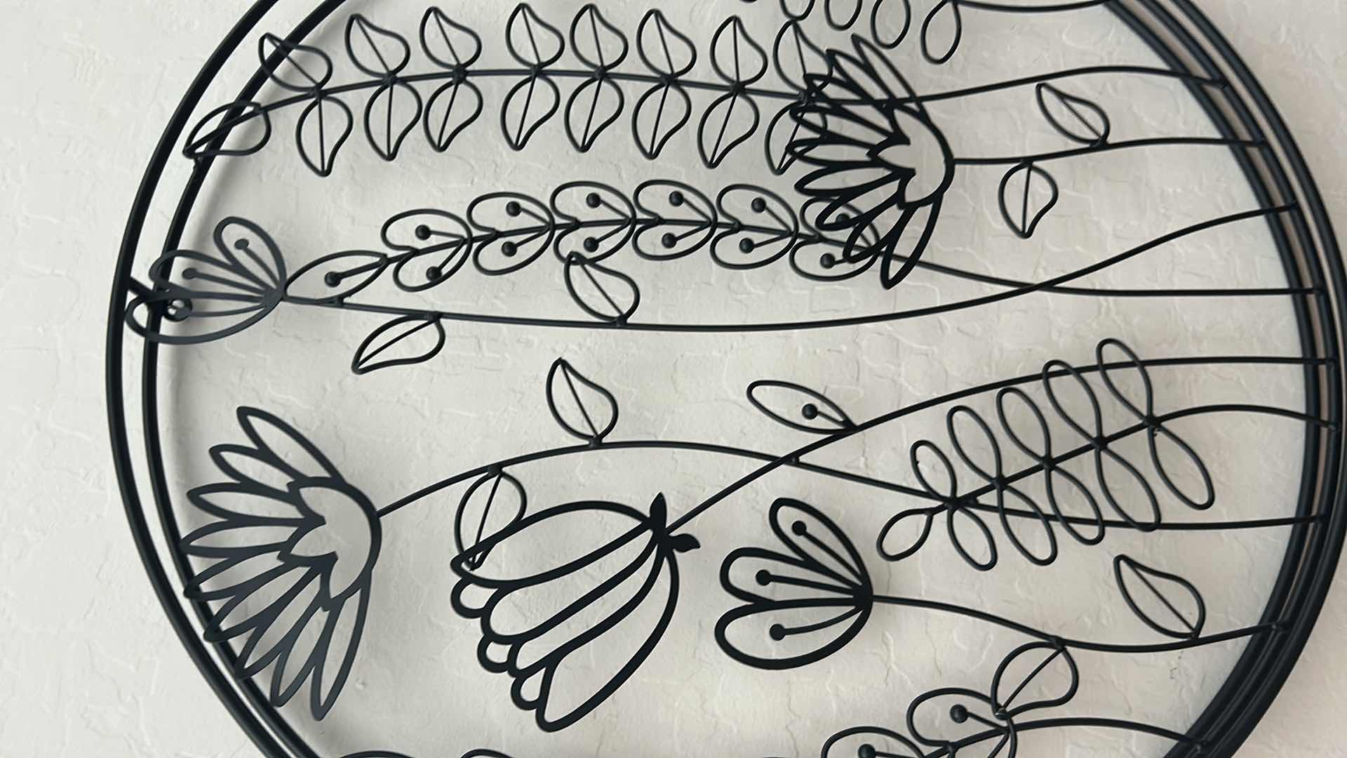 Photo 1 of ROUND BLACK METAL  WALL ART 20" X 20"