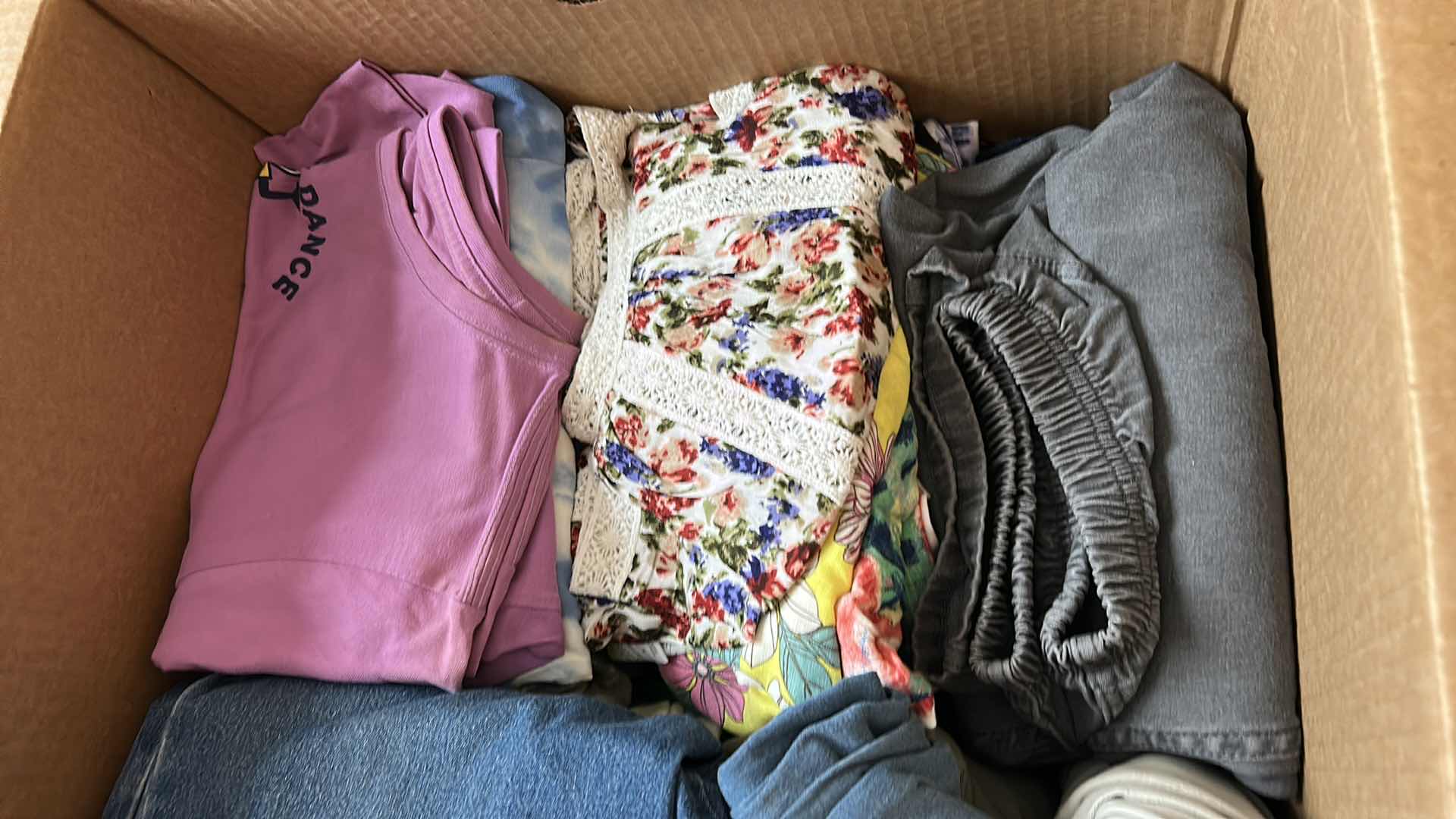 Photo 1 of BOX OF WOMENS CLOTHING, BLOUSES,  SHIRTS  AND PANTS  (ASSORTED SIZES)