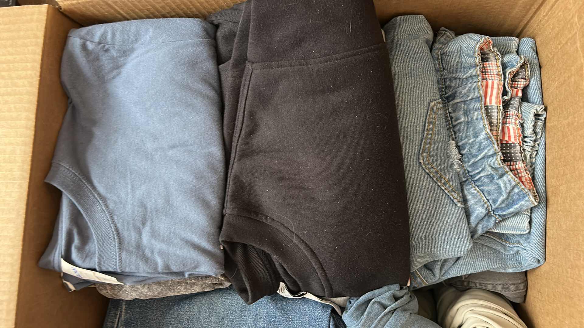 Photo 1 of BOX OF WOMENS CLOTHING, BLOUSES,  SHIRTS  AND PANTS  (ASSORTED SIZES)