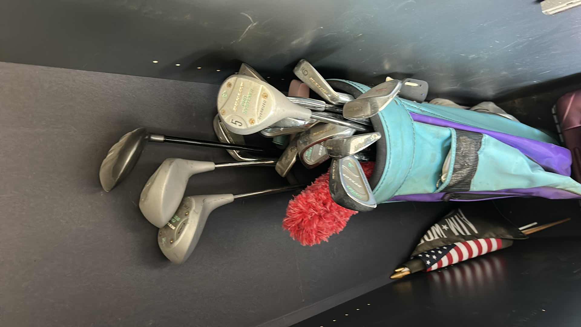 Photo 1 of CONTENTS OF CABINET - GOLF CLUB, TACKLE BOX AND FLAGS