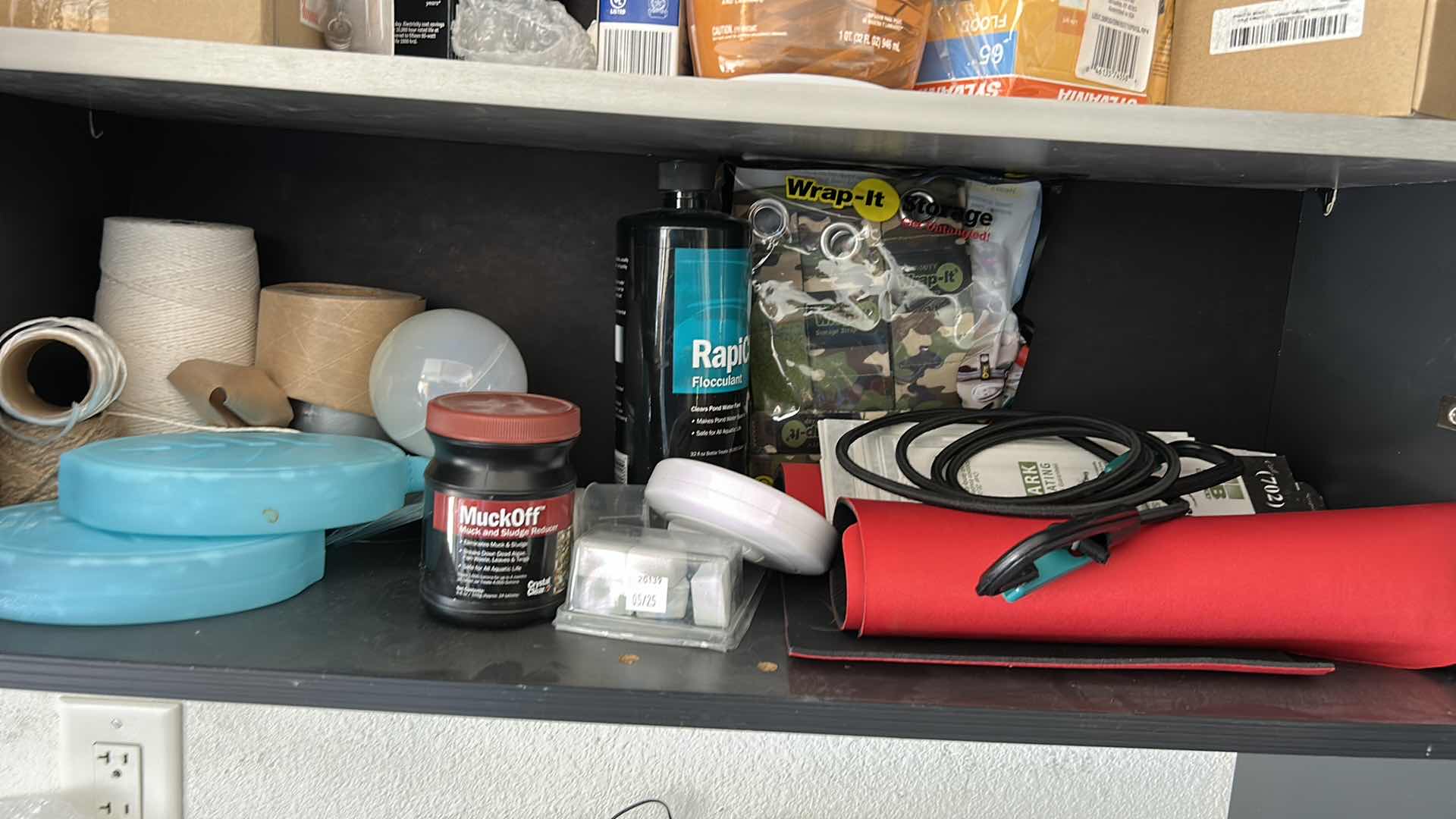 Photo 1 of CONTENTS OF CABINET IN GARAGE