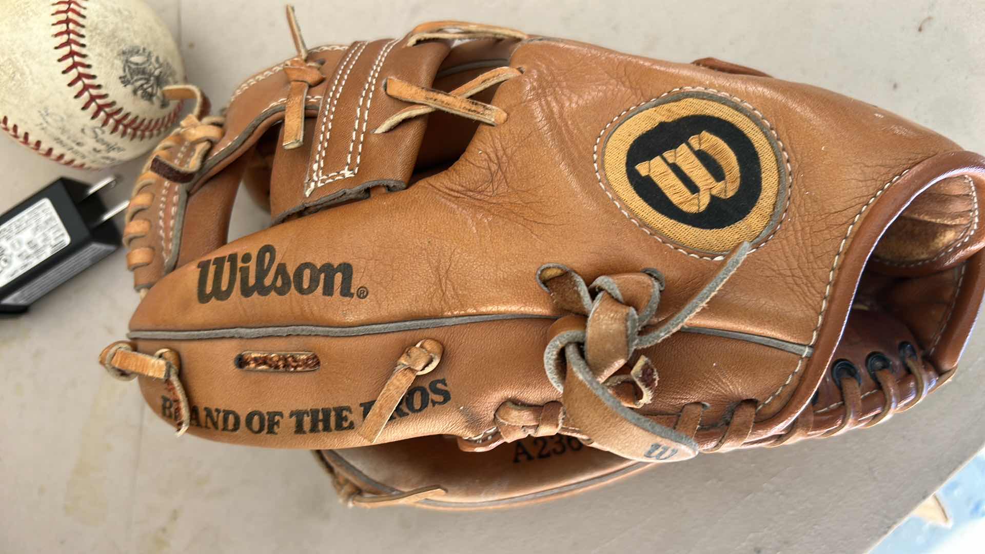 Photo 1 of BASEBALL GLOVE AND BALL