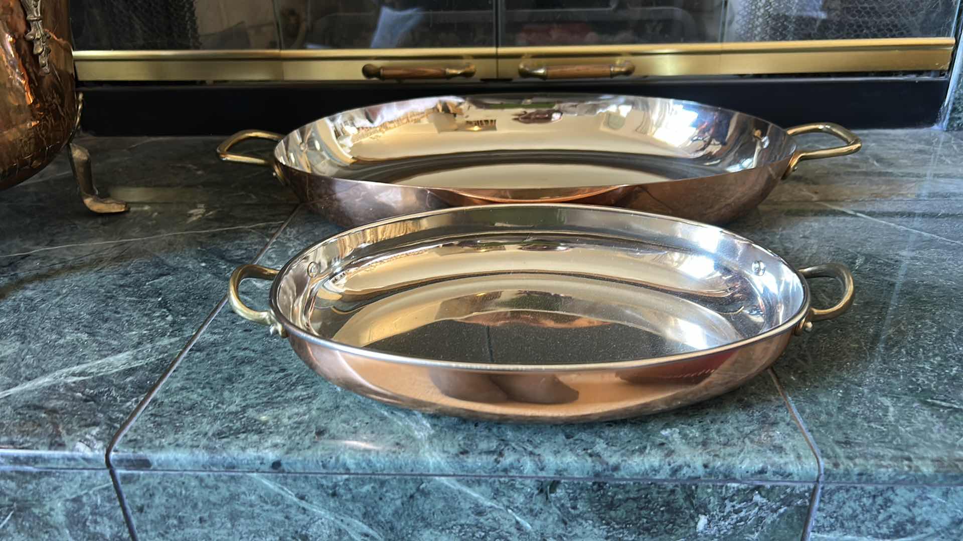 Photo 1 of 2 COPPER AND STAINLESS STEEL OVAL SERVING DISHES WITH BRASS HANDLES (LARGEST 19.5”)