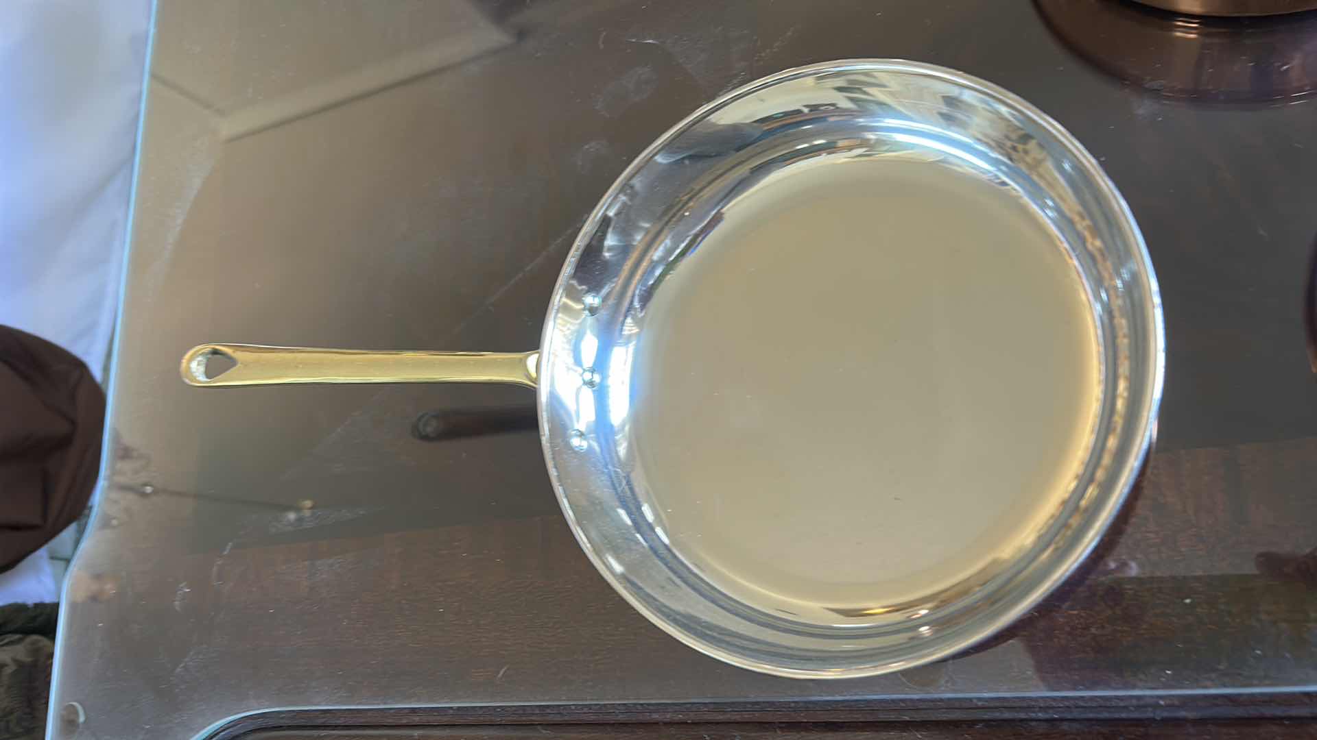 Photo 1 of 3 COPPER AND STAINLESS STEEL  SKILLETS AND PAN WITH BRASS HANDLES