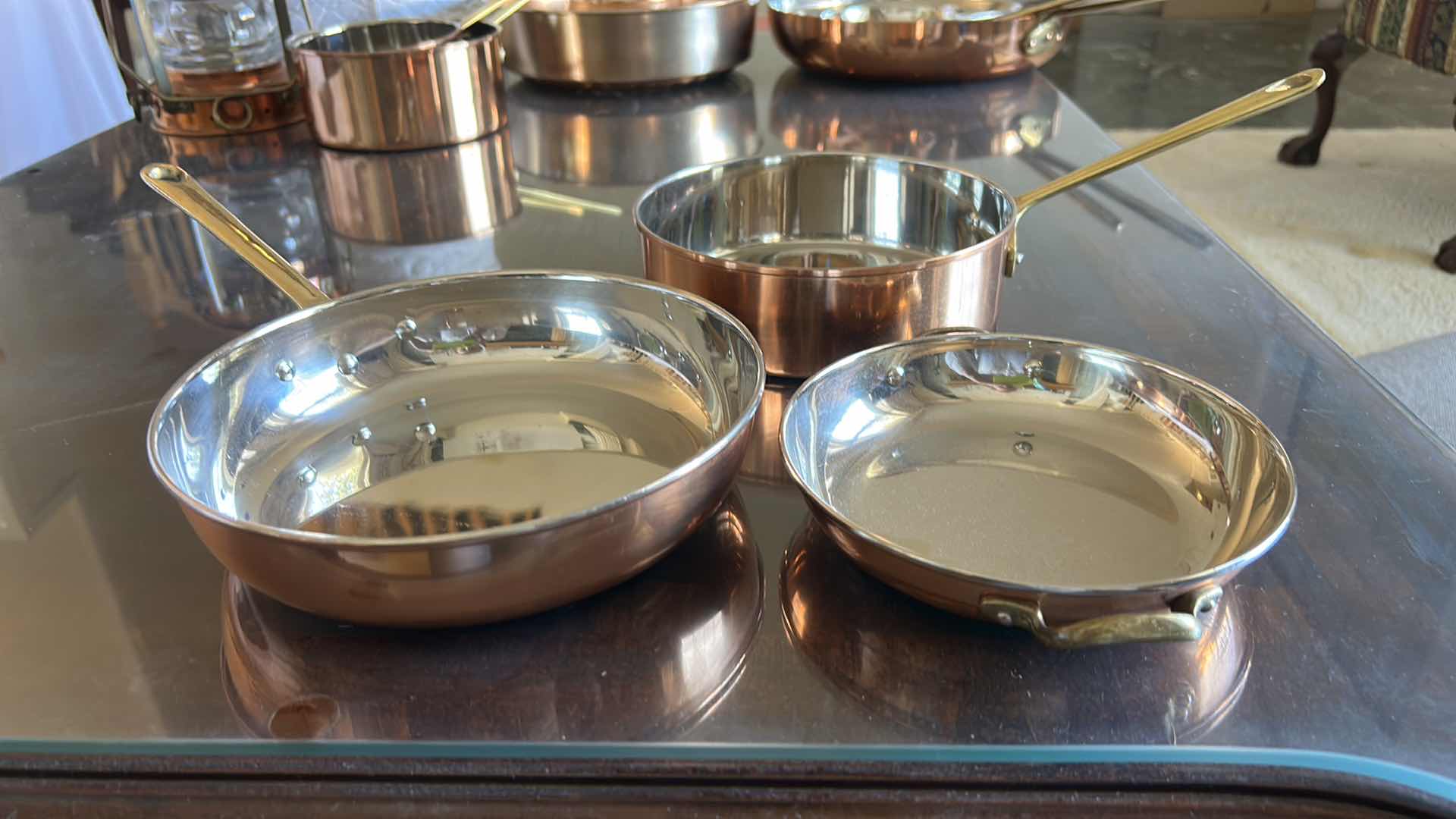 Photo 1 of 3 COPPER AND STAINLESS STEEL  SKILLETS AND PAN WITH BRASS HANDLES