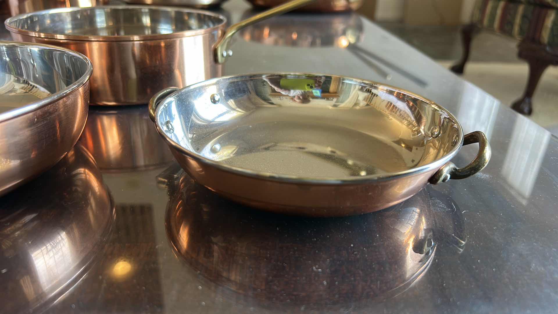 Photo 1 of 3 COPPER AND STAINLESS STEEL  SKILLETS AND PAN WITH BRASS HANDLES