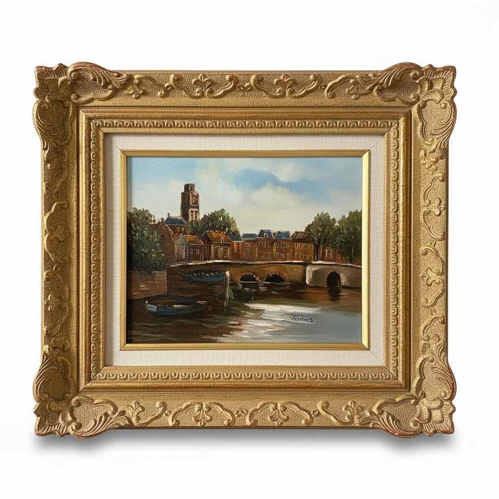 Photo 1 of ORNATELY WOOD AND RESIN FRAMED,  "VERMEES DUTCH TOWN RIVER” SIGNED OIL ON CANVAS, ARTWORK 15 1/2” x H17 1/2”