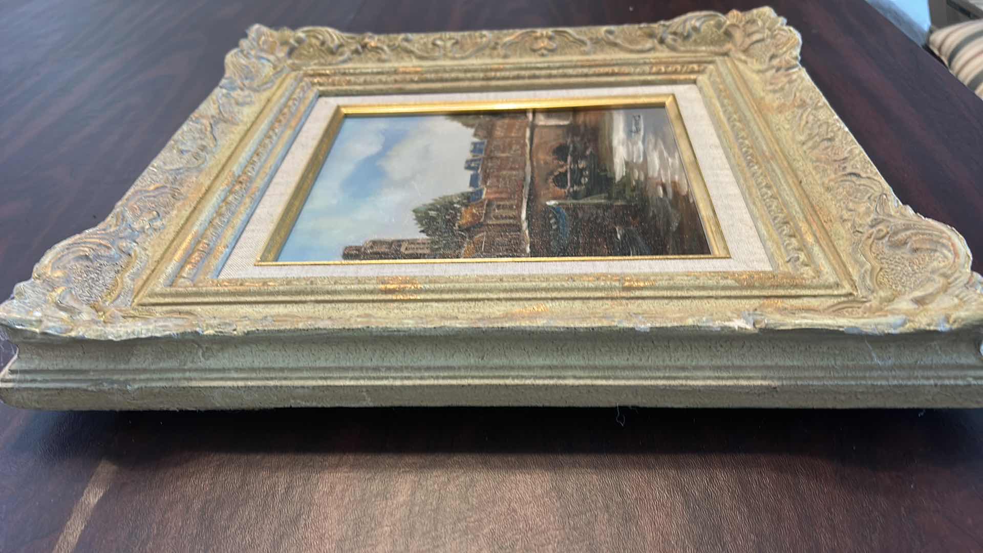 Photo 1 of ORNATELY WOOD AND RESIN FRAMED,  "VERMEES DUTCH TOWN RIVER” SIGNED OIL ON CANVAS, ARTWORK 15 1/2” x H17 1/2”