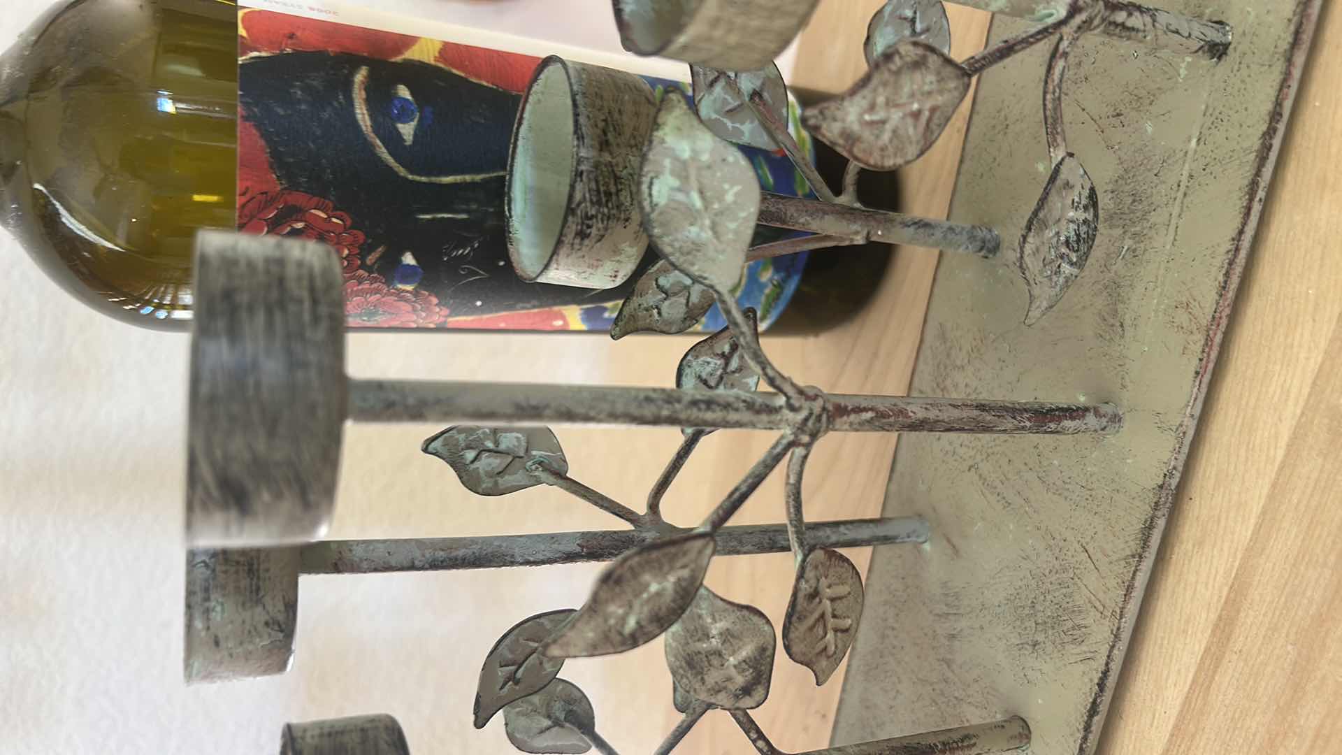 Photo 1 of METAL CANDLE HOLDER  23 1/2“ x H 7“AND WINE BOTTLE WITH CANDLE HOLDER