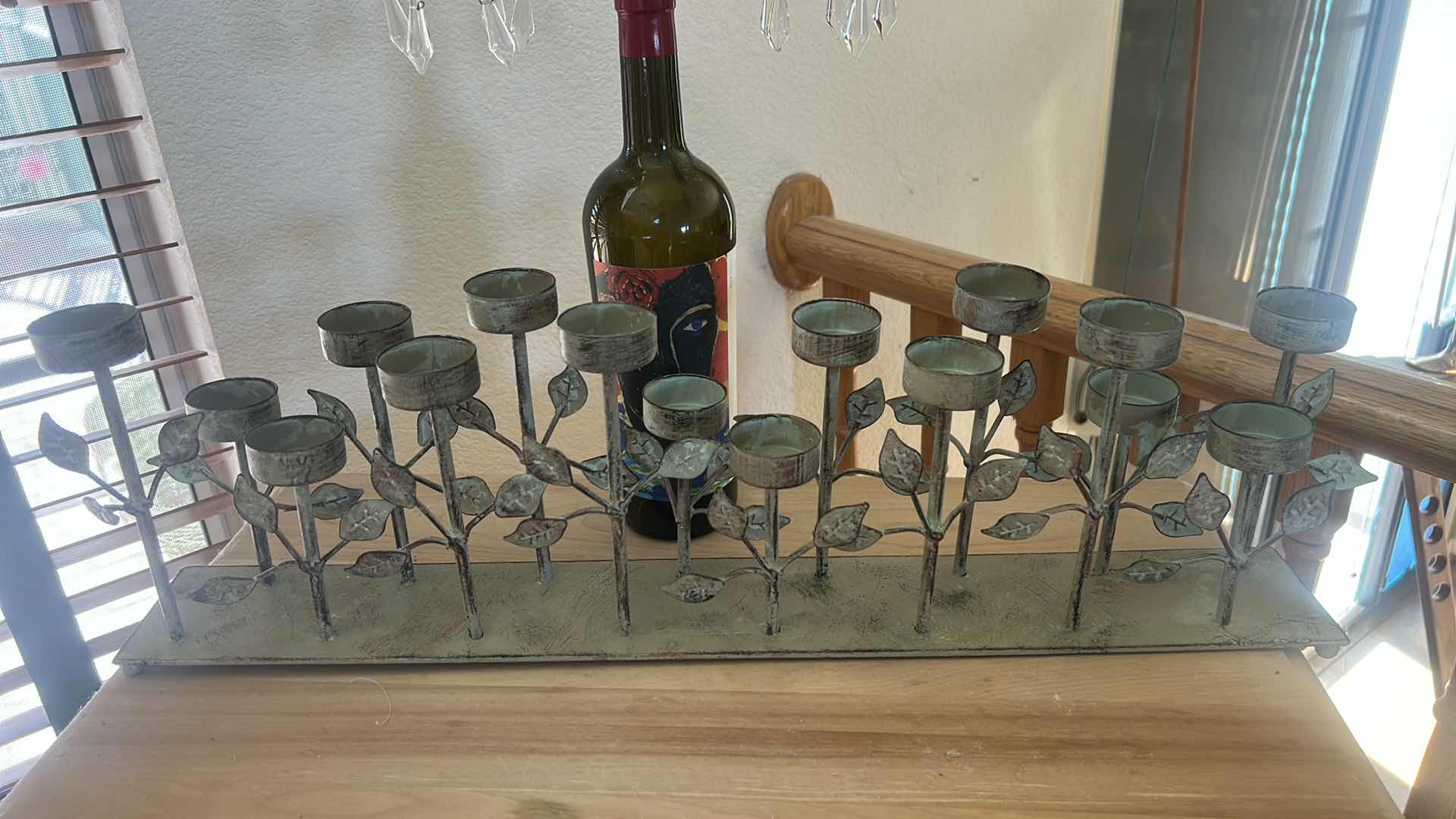 Photo 1 of METAL CANDLE HOLDER  23 1/2“ x H 7“AND WINE BOTTLE WITH CANDLE HOLDER