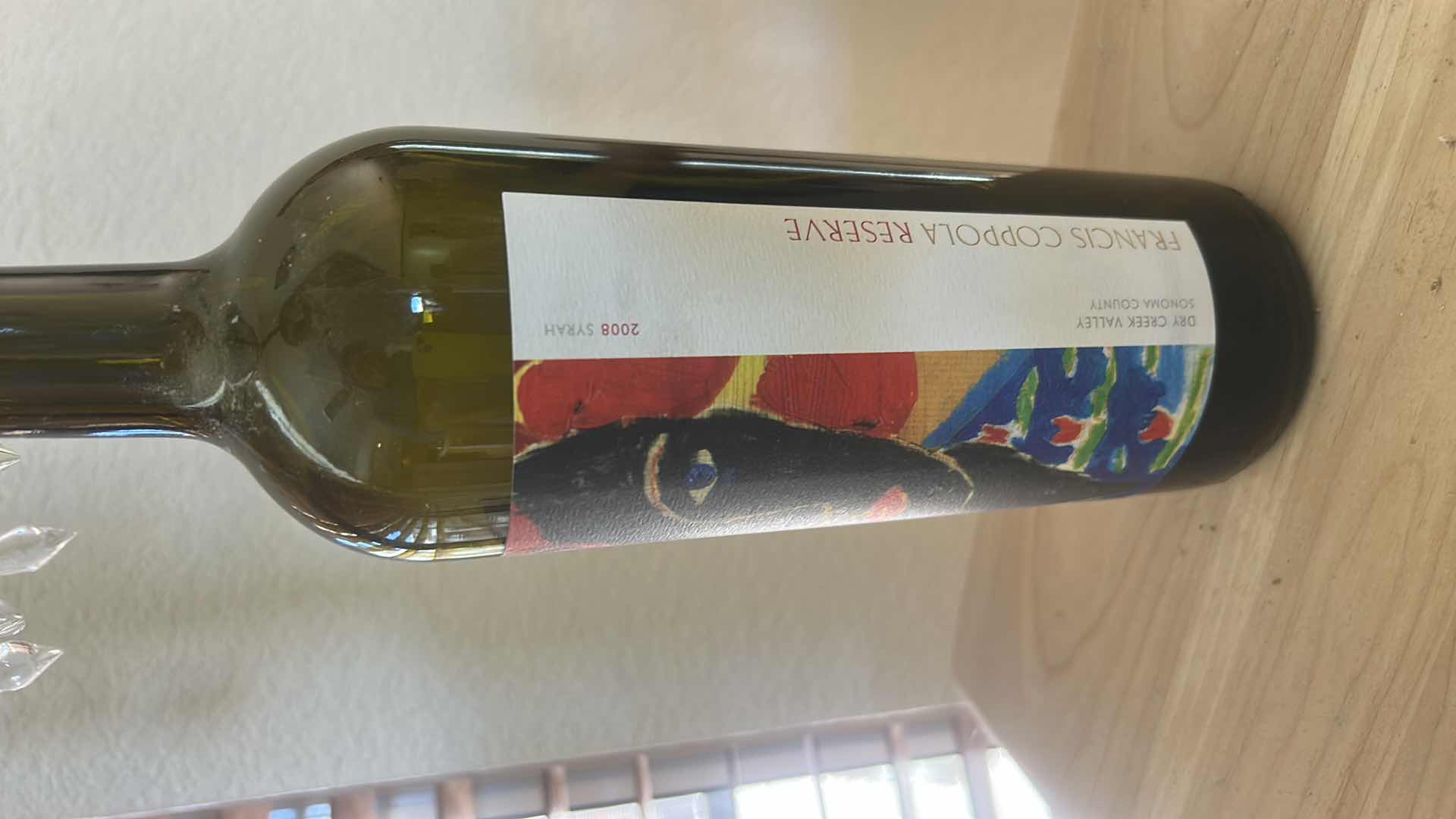 Photo 1 of METAL CANDLE HOLDER  23 1/2“ x H 7“AND WINE BOTTLE WITH CANDLE HOLDER