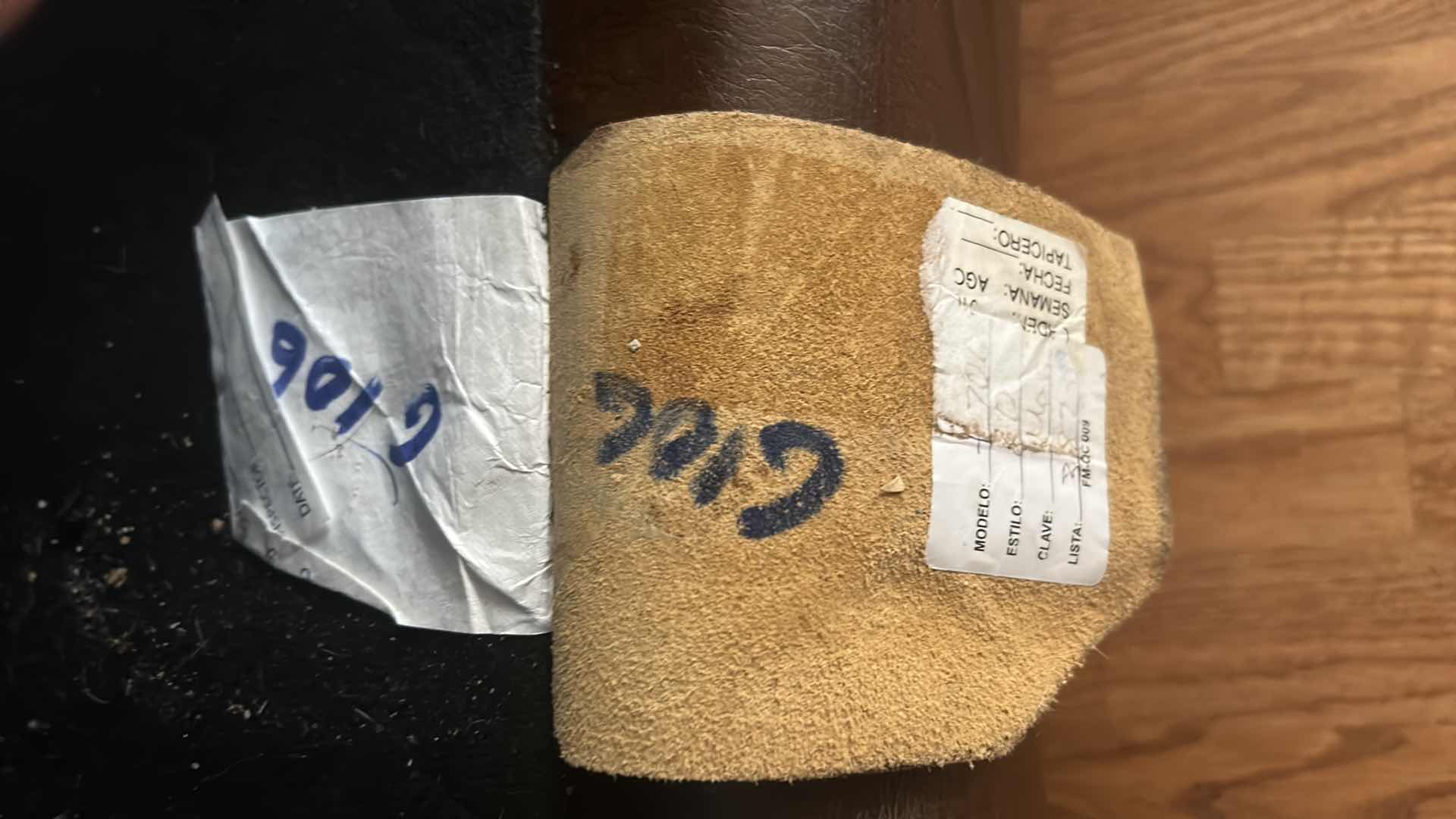 Photo 1 of BROWN LEATHER LOVESEAT WITH NAIL HEAD TRIM AND WOOD BASE & LEGS  69“ x 39“ x H36“