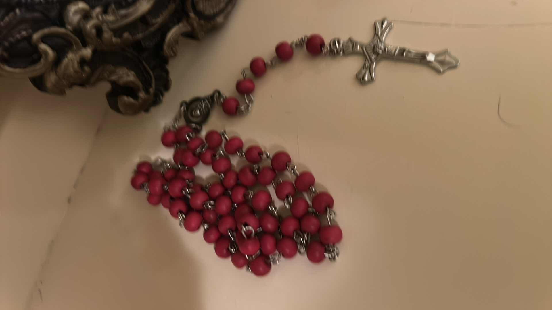 Photo 1 of RELIGIOUS ITEMS- WALL PLAQUE AND ROSARY IN CASE