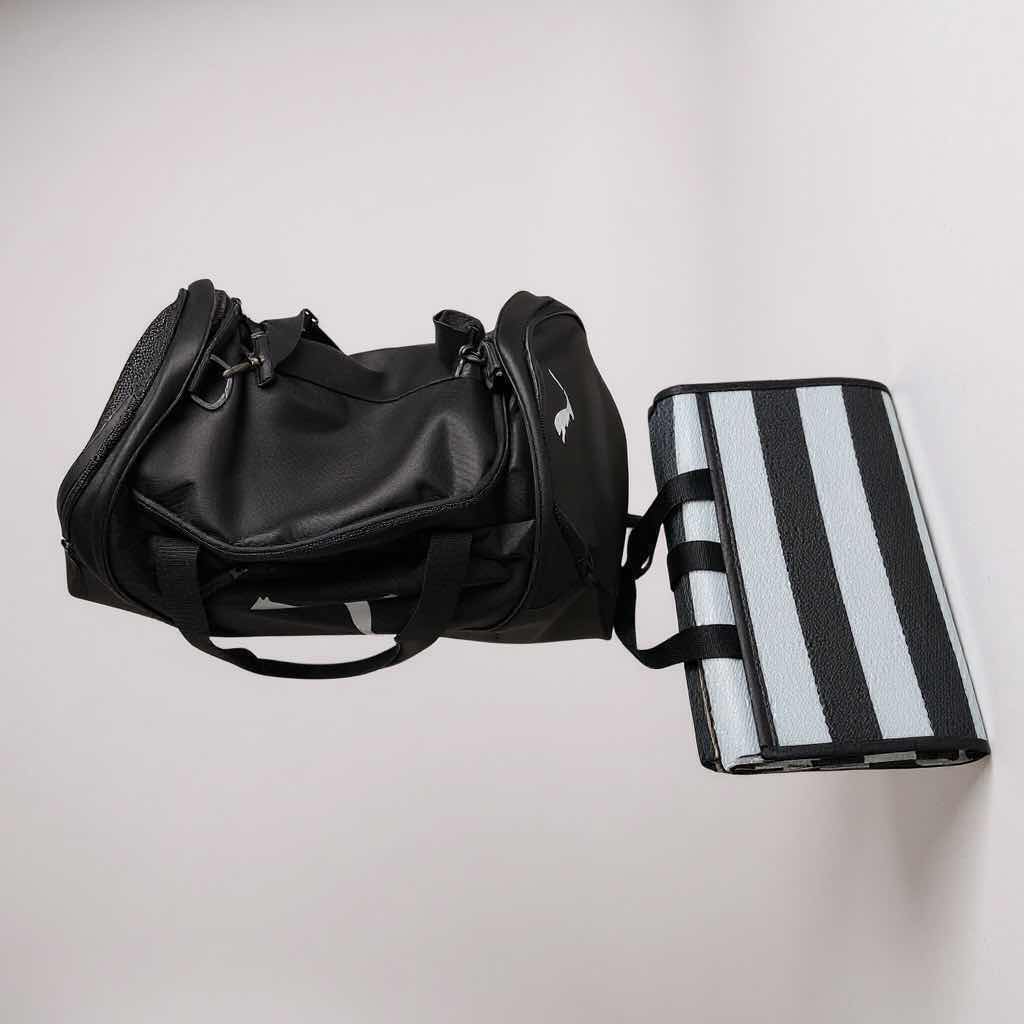 Photo 1 of TRAVEL MAT & BLACK GYM BAG