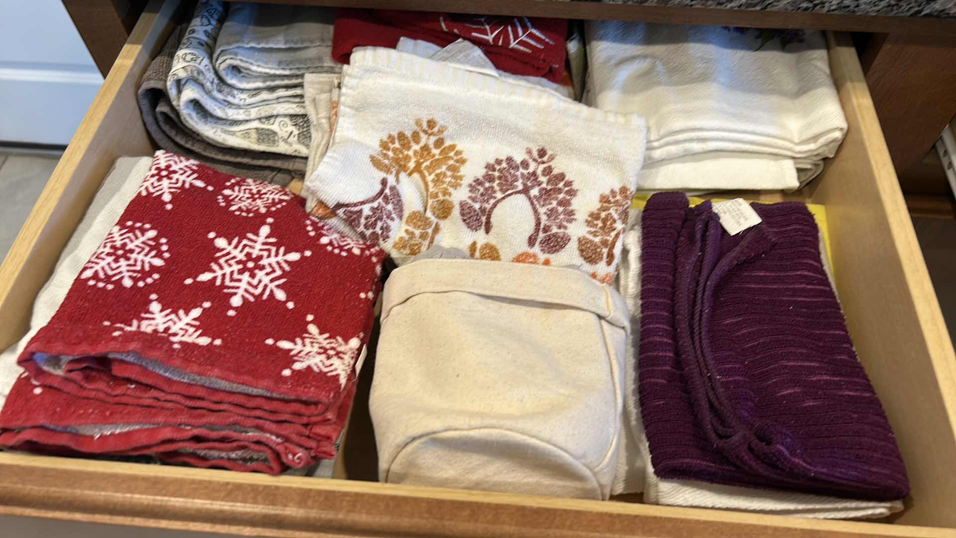 Photo 1 of CONTENTS OF TWO TOP DRAWERS IN KITCHEN