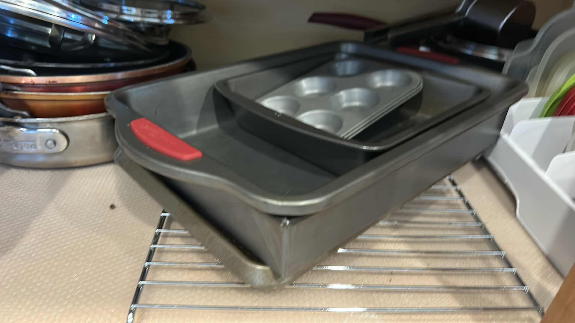 Photo 1 of CONTENTS OF TWO CABINETS IN KITCHEN