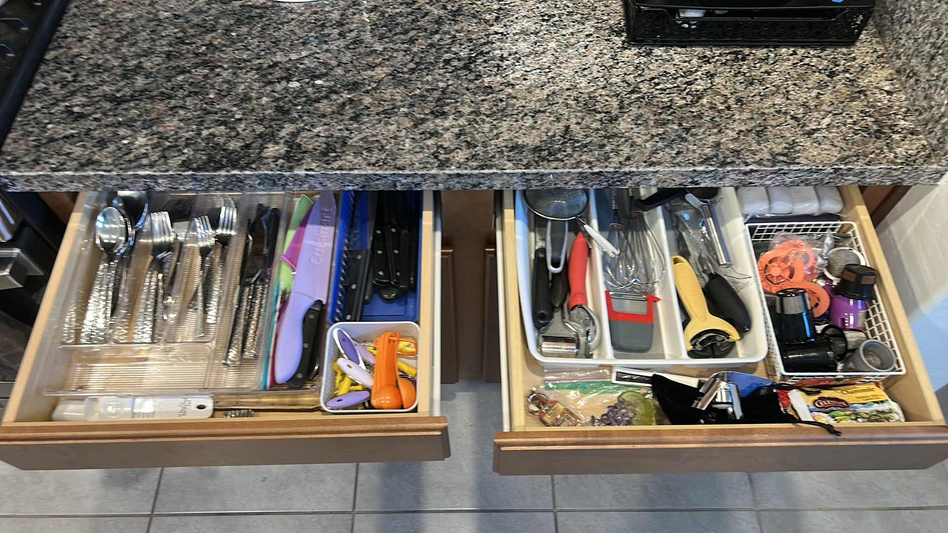 Photo 1 of CONTENTS OF TWO DRAWERS IN KITCHEN