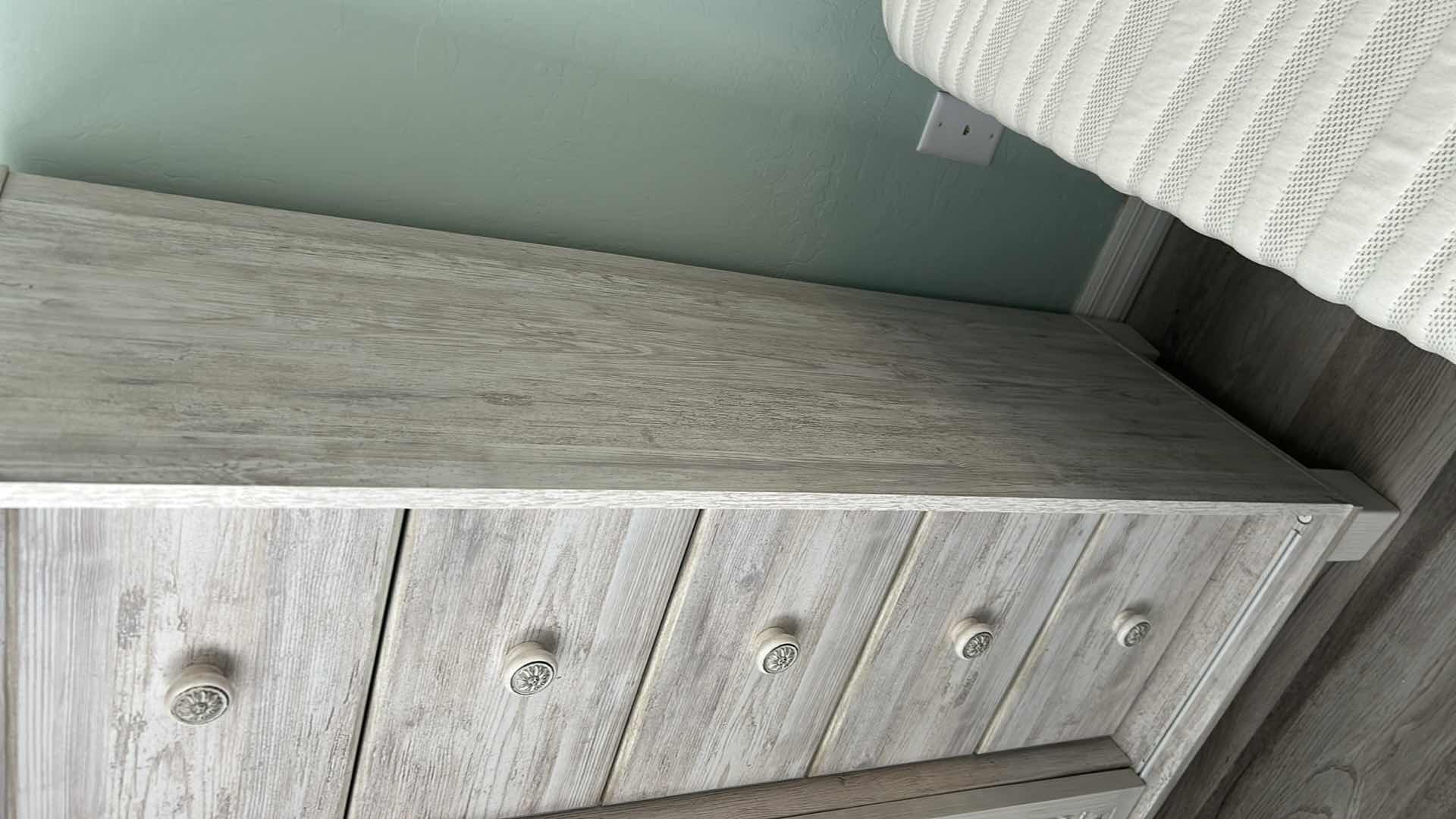 Photo 1 of ASHLEY PAXBERRY DRESSING CHEST W WHITEWASH FINISH AND CARVED SLIDING DOOR 37" X 19" H 56"