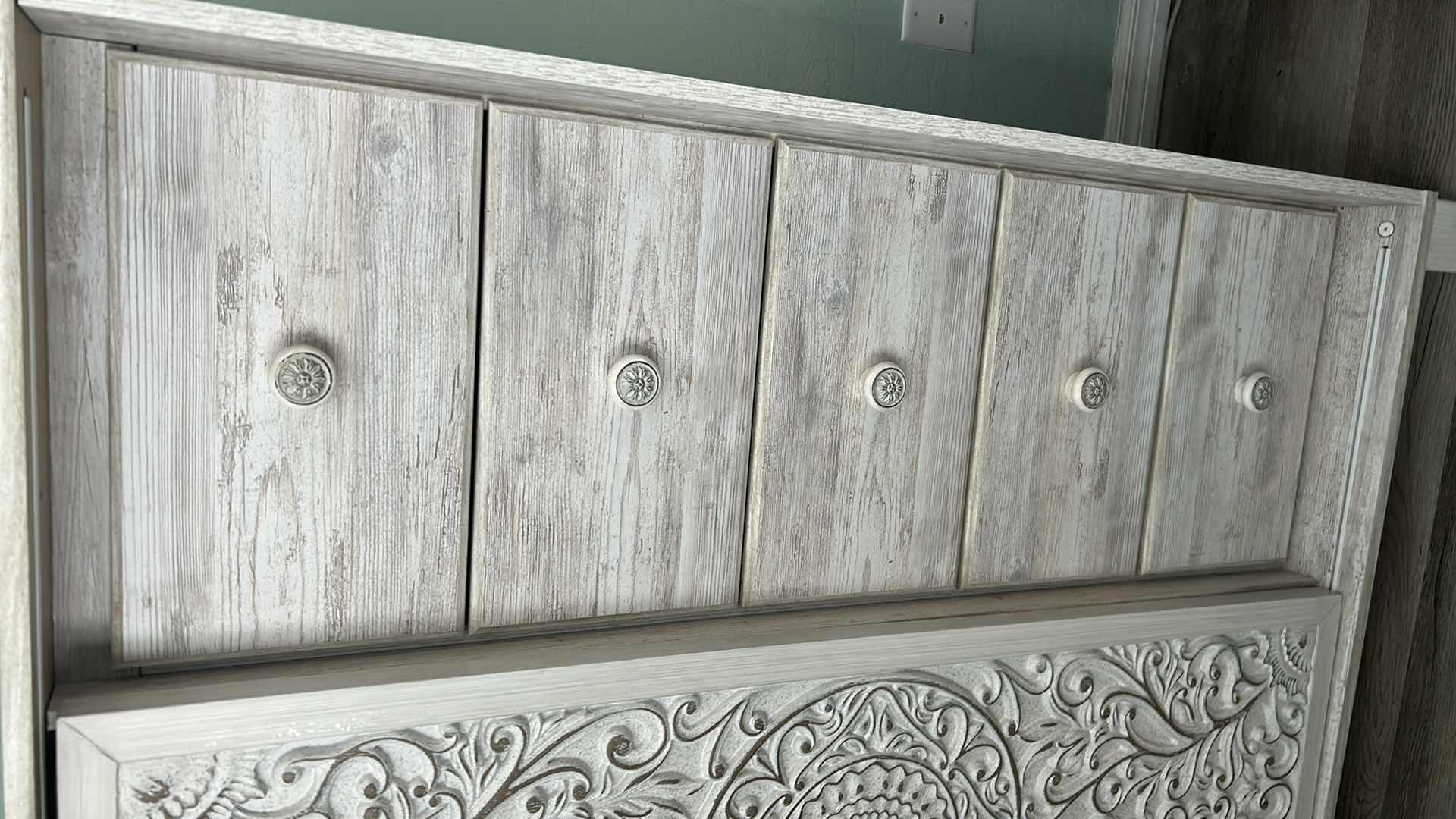 Photo 1 of ASHLEY PAXBERRY DRESSING CHEST W WHITEWASH FINISH AND CARVED SLIDING DOOR 37" X 19" H 56"