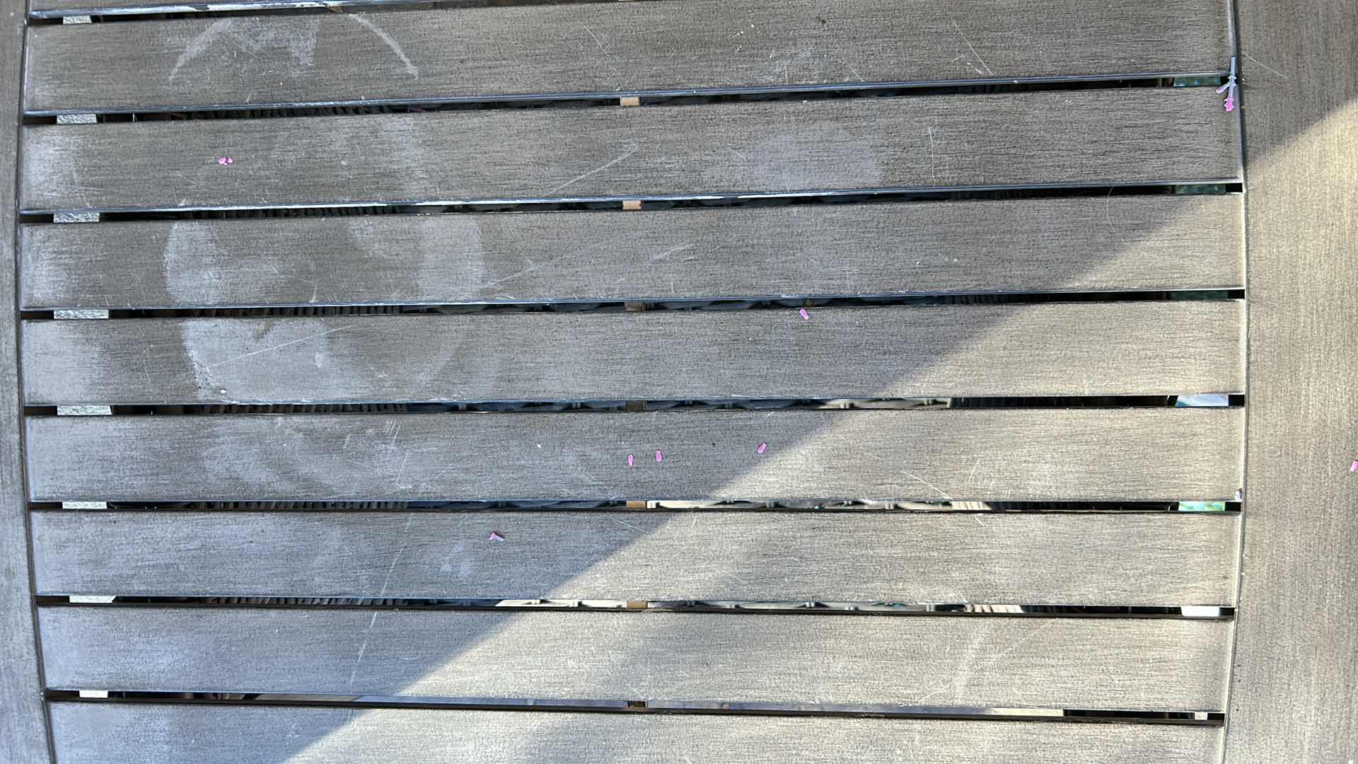 Photo 1 of OUTDOOR TABLE W SLATED TOP AND WOVEN BASE 26" X 24" H 22"