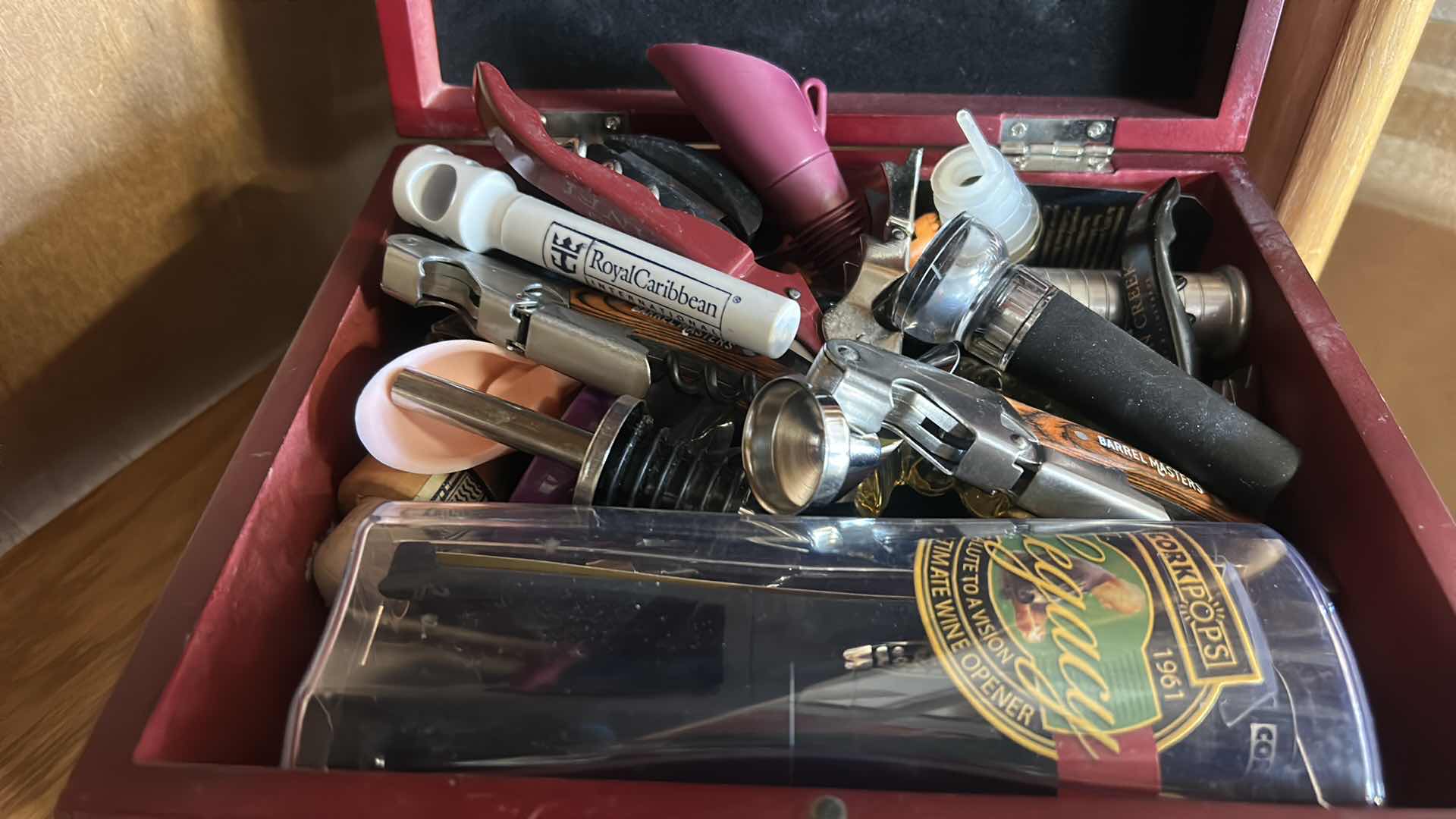 Photo 1 of BOX FULL OF BOTTLE OPENERS