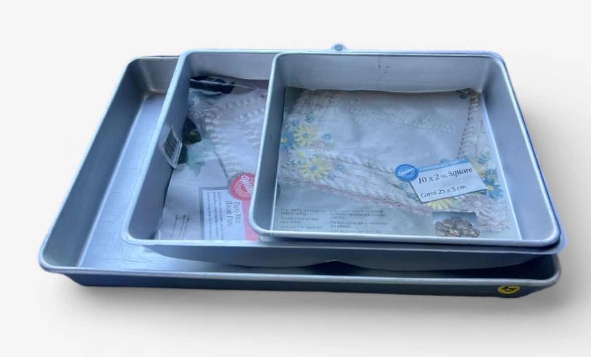 Photo 1 of CAKE MOLDS 
(LARGEST 19”)