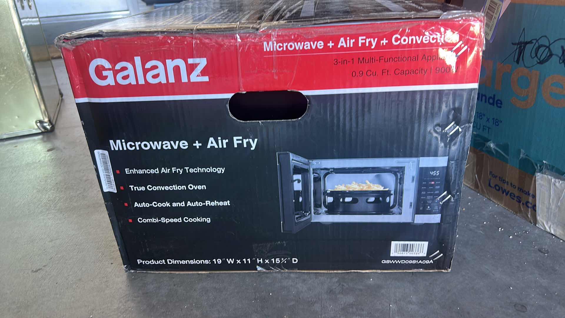 Photo 1 of NEW GALANZ 3-IN-1 COUNTERTOP APPLIANCE THAT FUNCTIONS AS A MICROWAVE, CONVECTION OVEN, AND AIR FRYER.