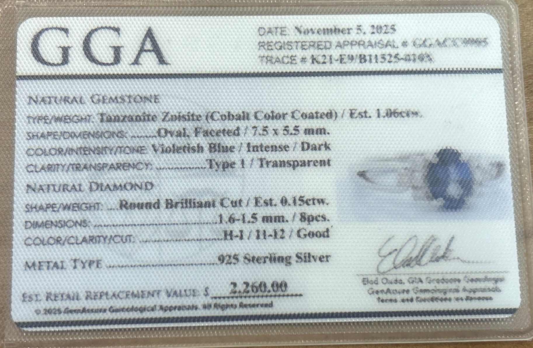 Photo 1 of STERLING SILVER W NATURAL TANZANITE (HEATED) APPROX 1.06 CT OVAL FACETED AND NATURAL DIAMOND 0.15 CTW RING GGA CERTIFIED (EST SIZE 7.5)- RN040648