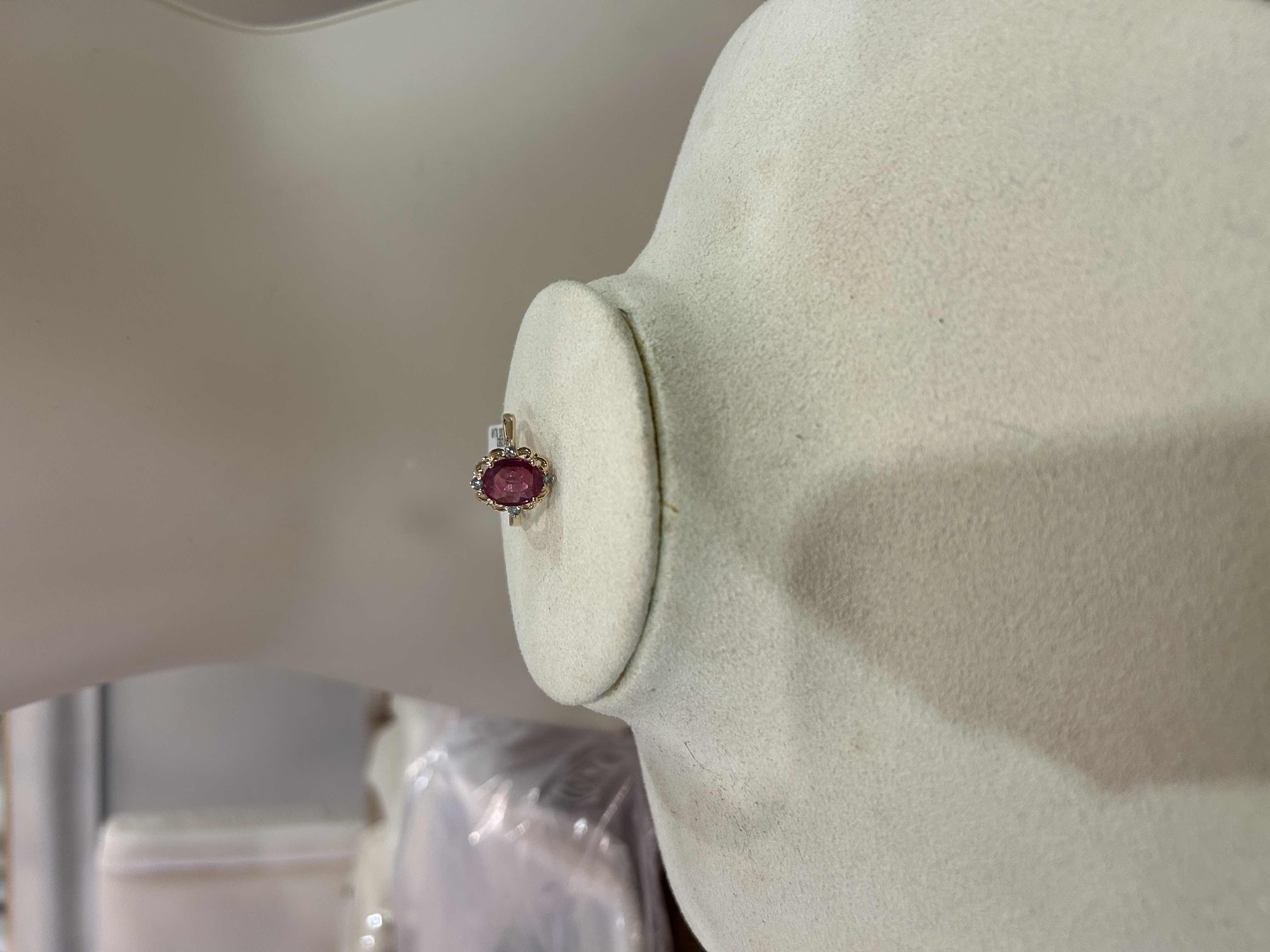 Photo 1 of STERLING SILVER W GOLD OVERLAY W NATURAL RUBY CORUNDUM APPROX 2.94 CTW OVAL BRILLIANT FACETED AND NATURAL DIAMOND 0.18 CTW RING GGA CERTIFIED EST RING SIZE 6-7) -RN040646